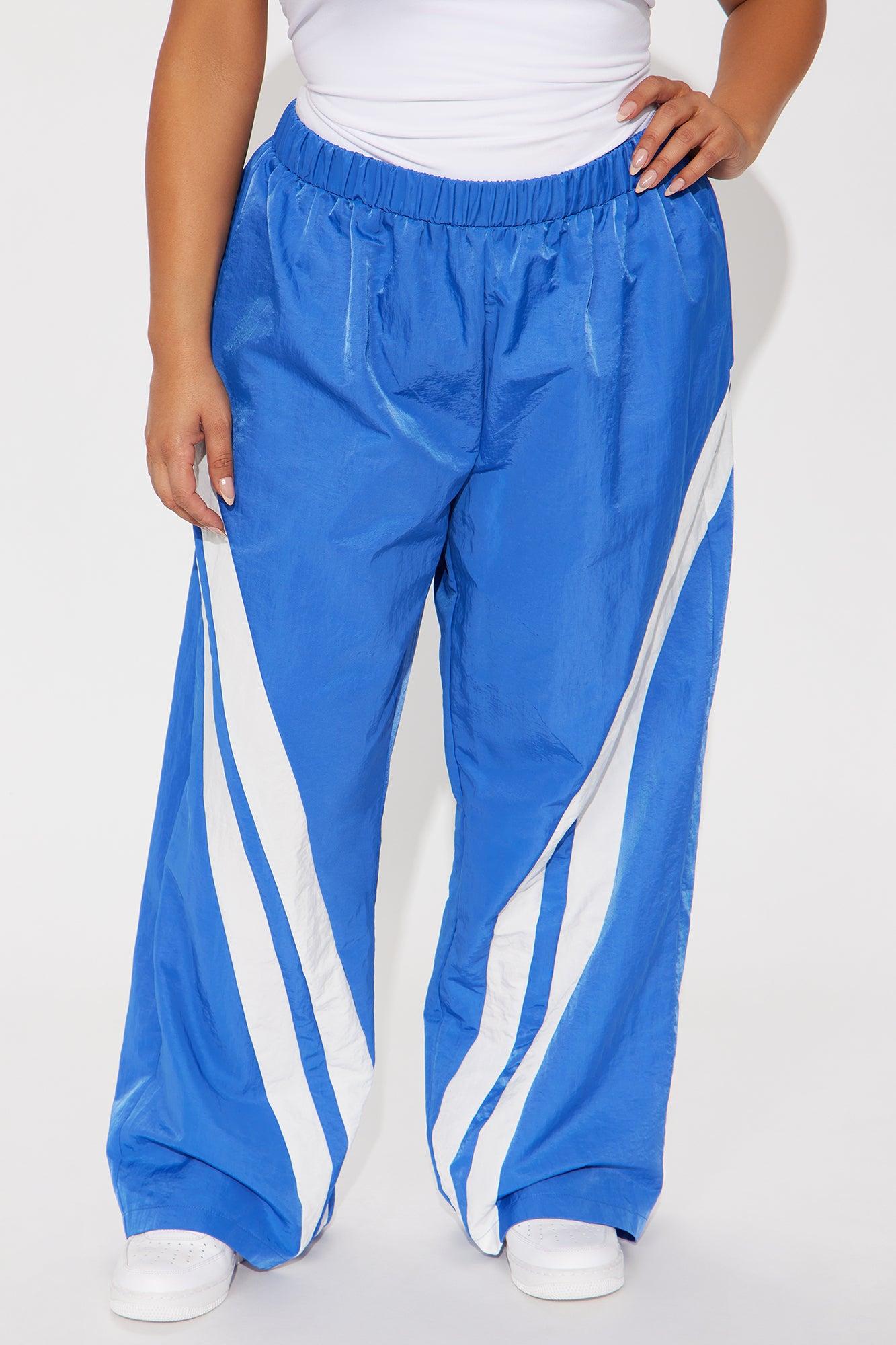 Follow The Curve Windbreaker Track Pant - Blue Female Product Image