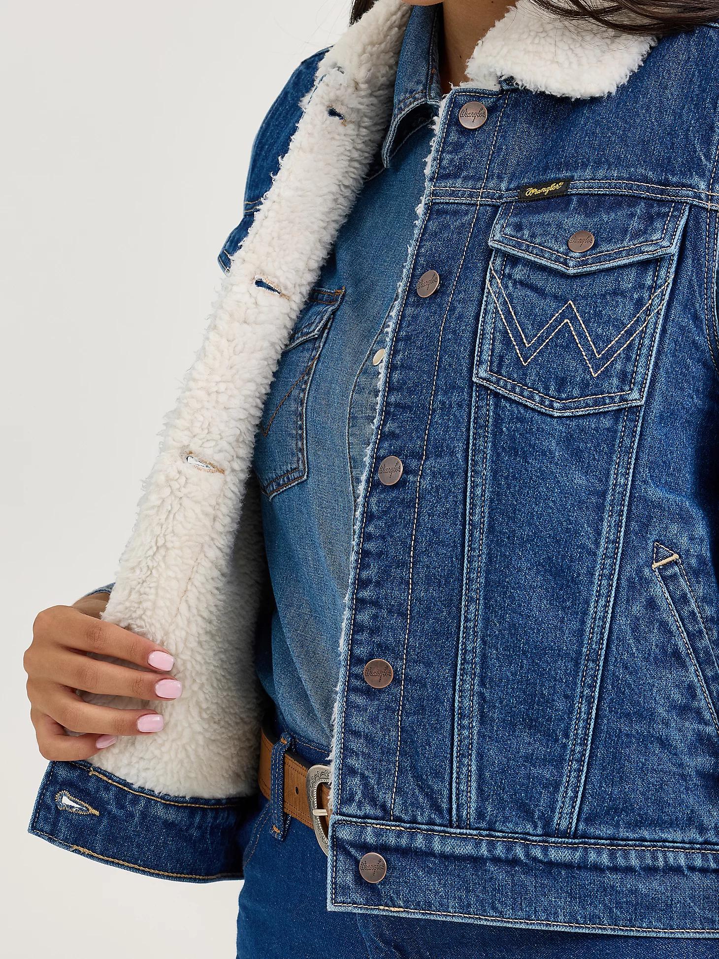 Women's Wrangler Sherpa Lined Denim Vest in Mid Product Image
