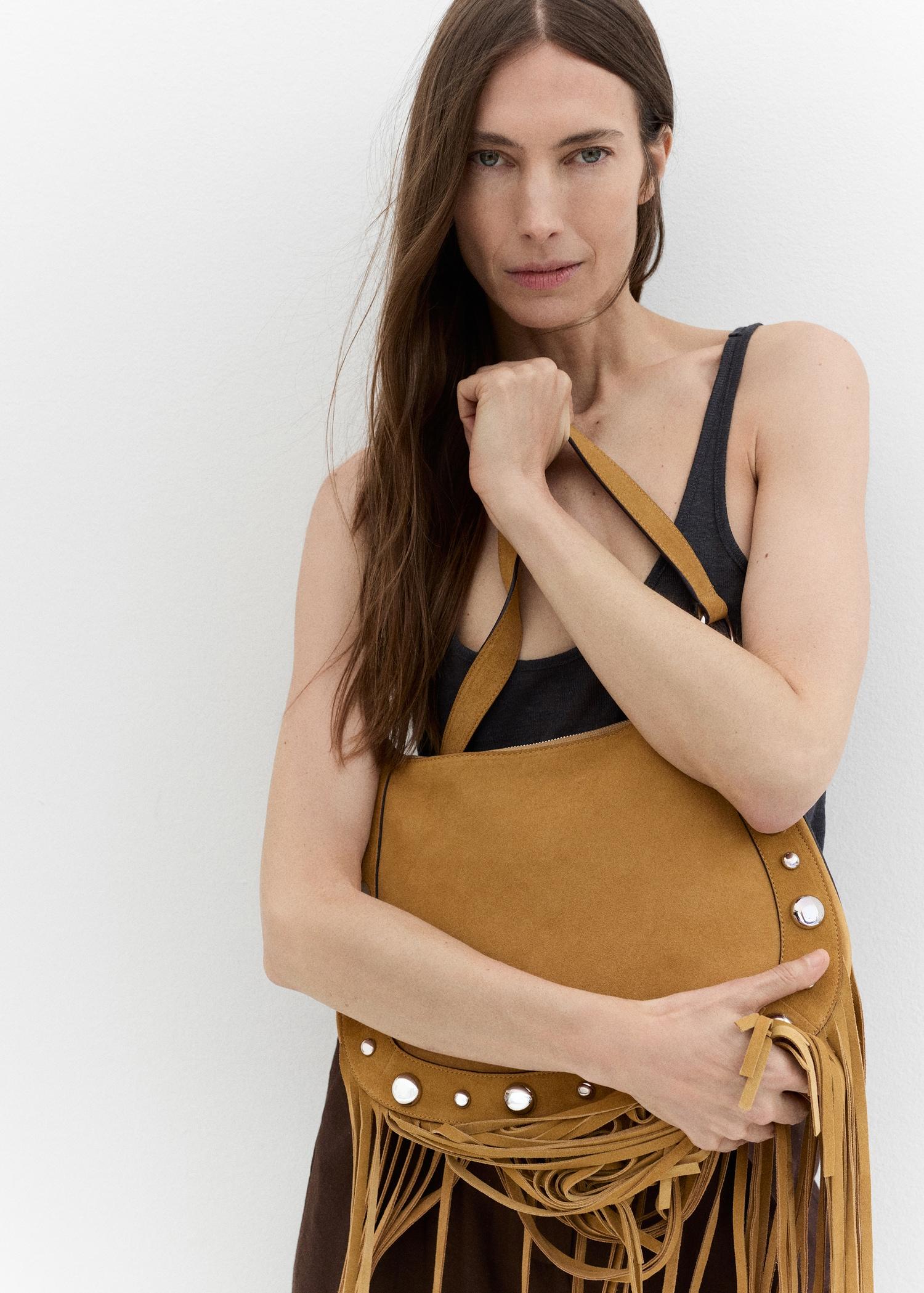 Suede bag with fringes and stud details - Women | MANGO USA Product Image