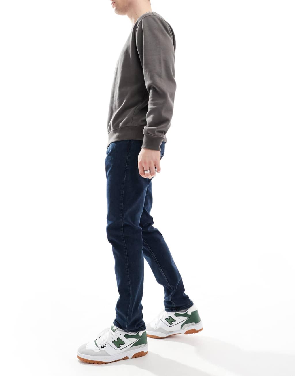 Tommy Jeans Austin slim tapered jeans in dark wash Product Image