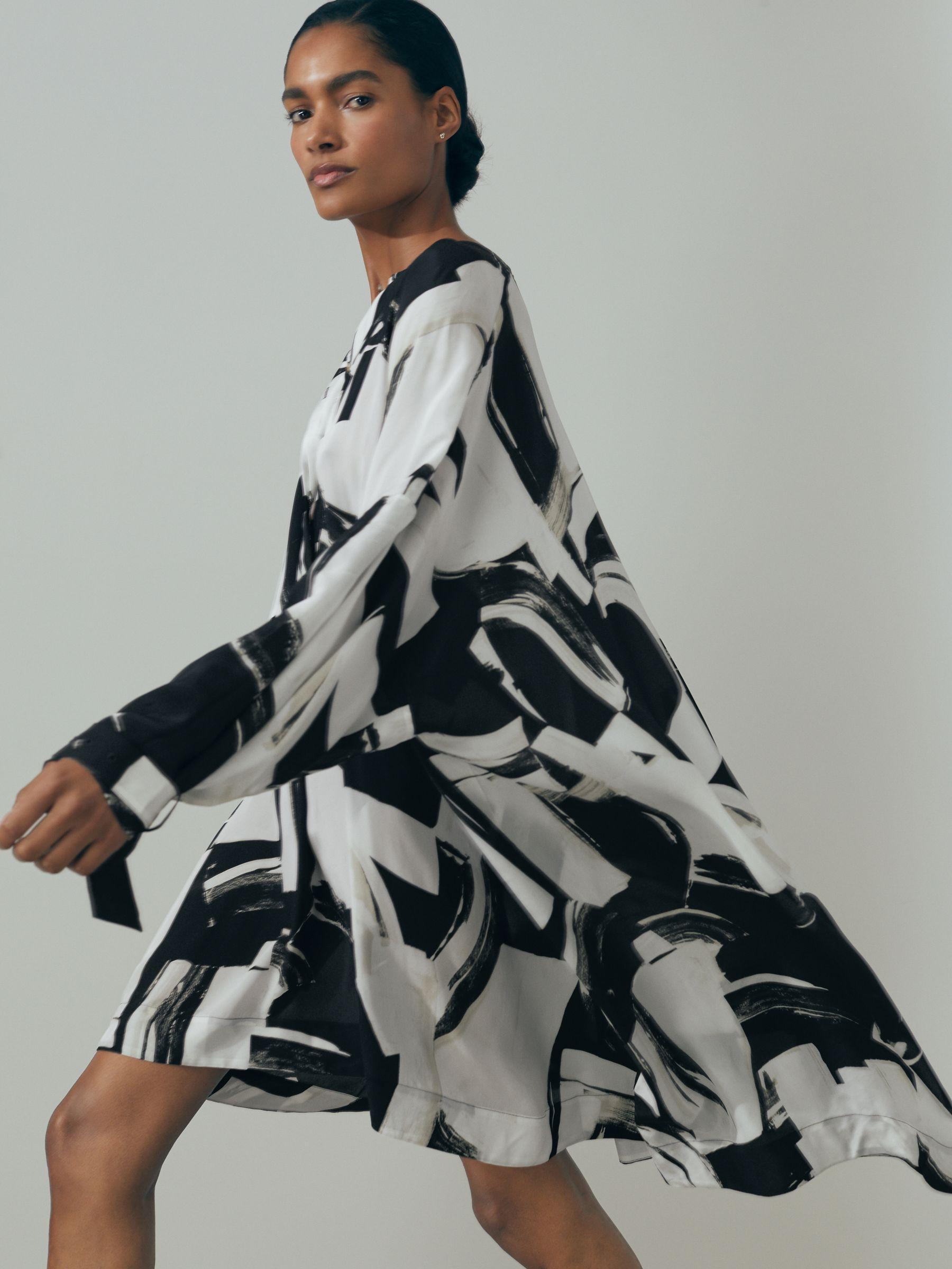 Atelier Italian Cape Sleeve Mini Dress in White/Black Product Image