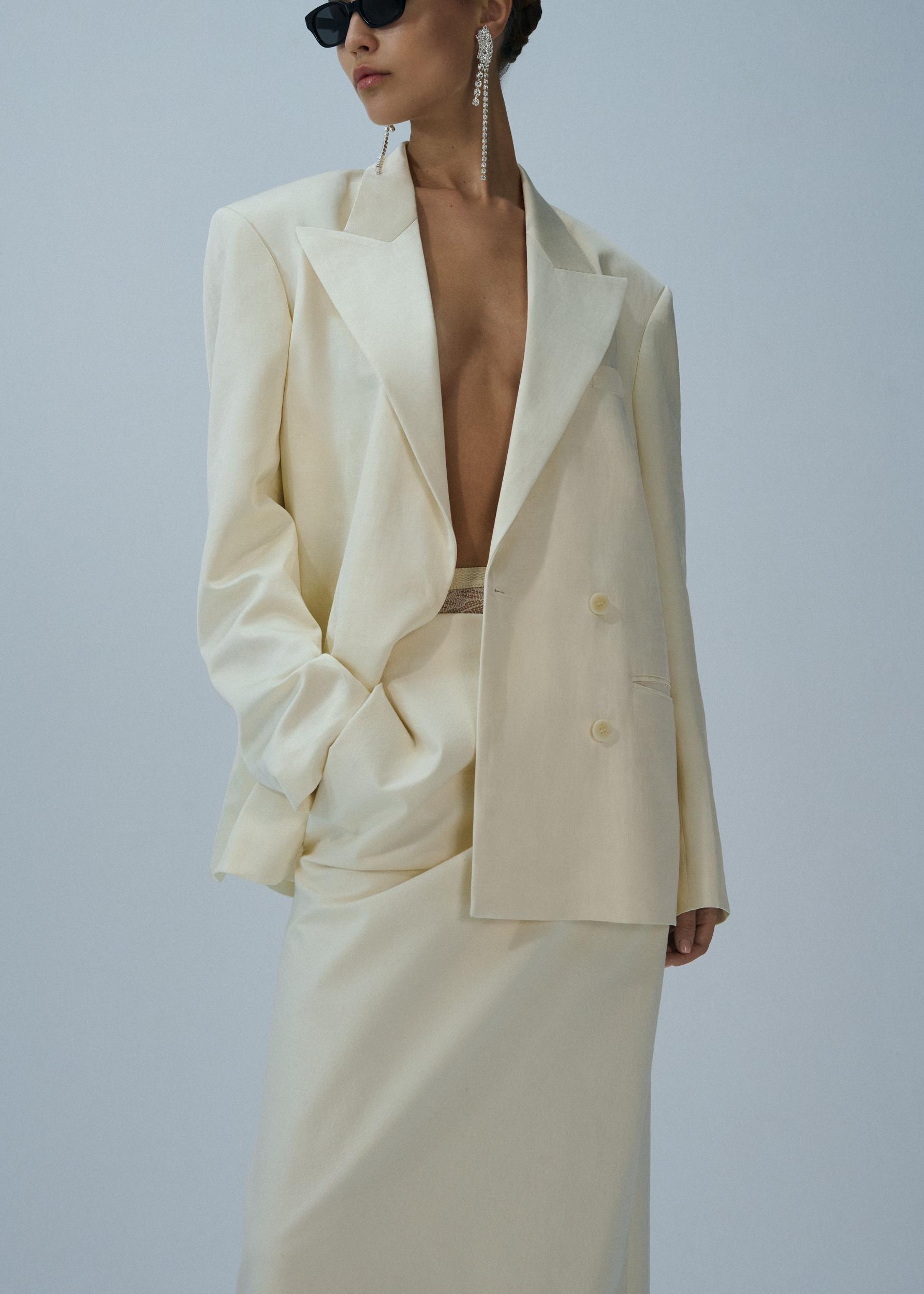 Silk draped midi skirt in cream Product Image