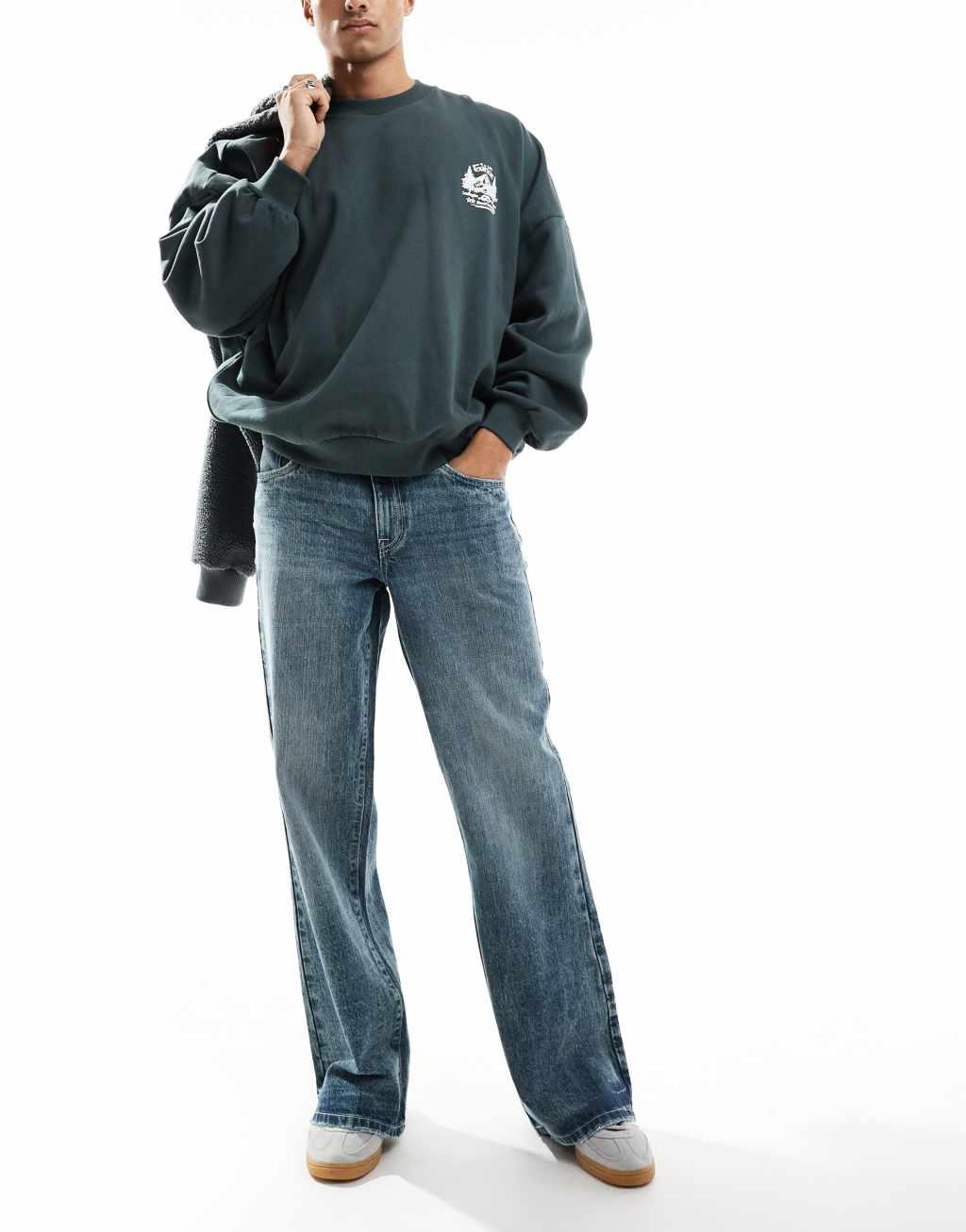 ASOS DESIGN wide flare jeans in gray blue wash Product Image