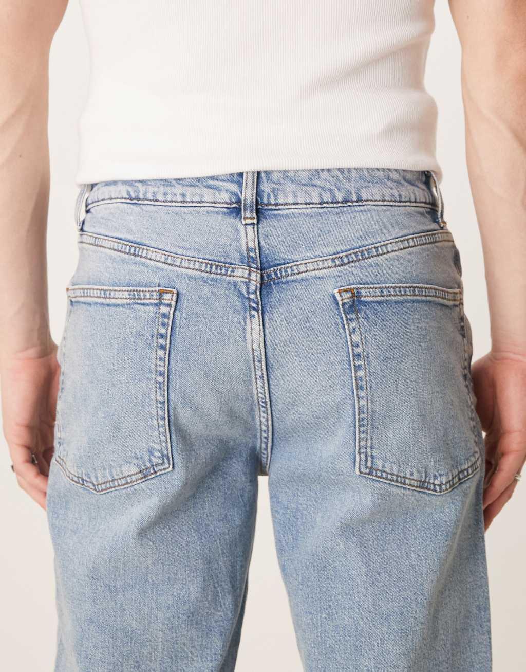 ASOS DESIGN straight stretch jeans with in mid wash blue Product Image