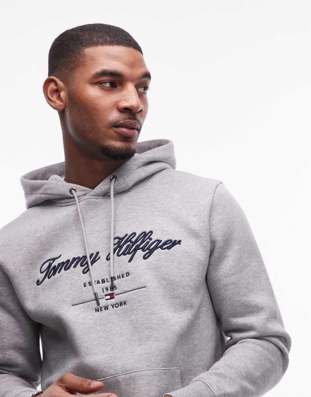 Tommy Hilfiger script logo hoodie in gray Product Image