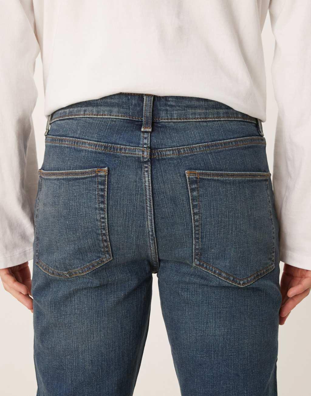 ASOS DESIGN stretch flare jeans in dark wash blue Product Image