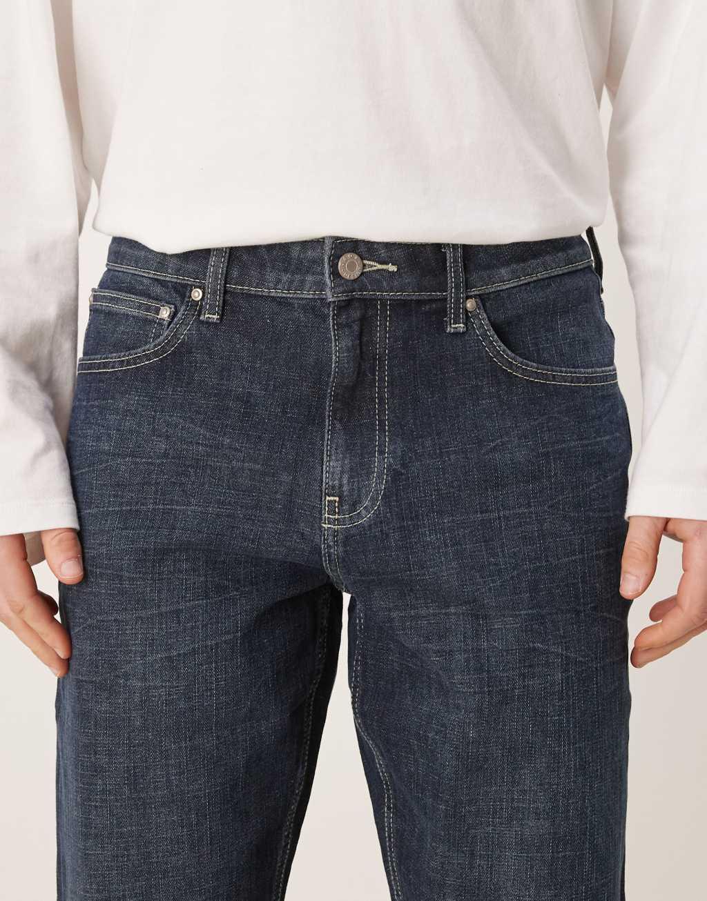 ASOS DESIGN stretch tapered jeans in dark wash blue Product Image