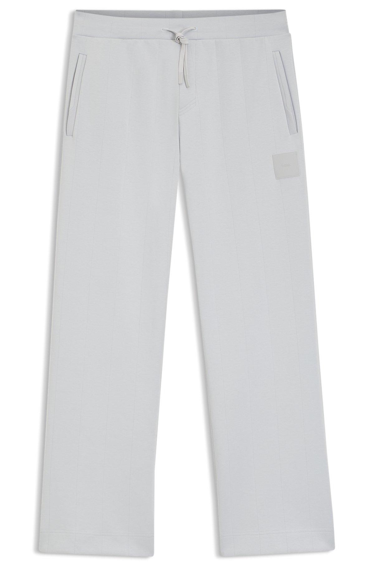 Tracksuit bottoms in a drop-needle cotton Product Image