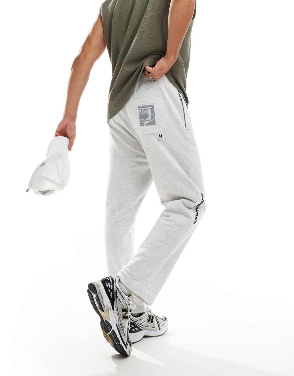 Aape By A Bathing Ape logo tapered sweatpants in heather gray Product Image