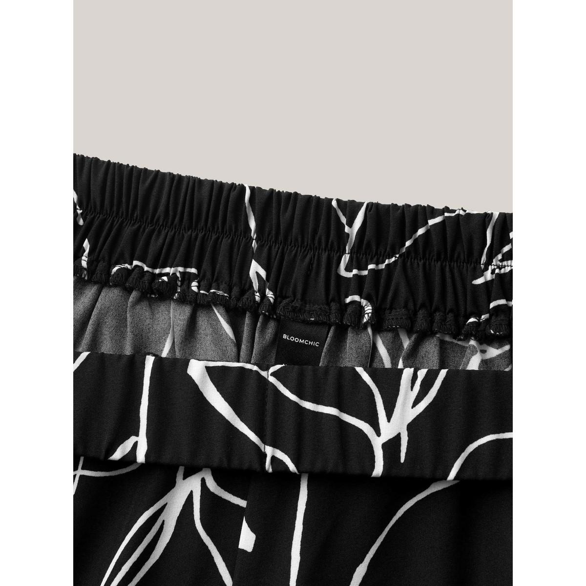 Plus Size Abstract Print Flowy Wide-Leg Pants Women Black Office Wide Leg Mid Rise Office Pants BloomChic 12/L Product Image