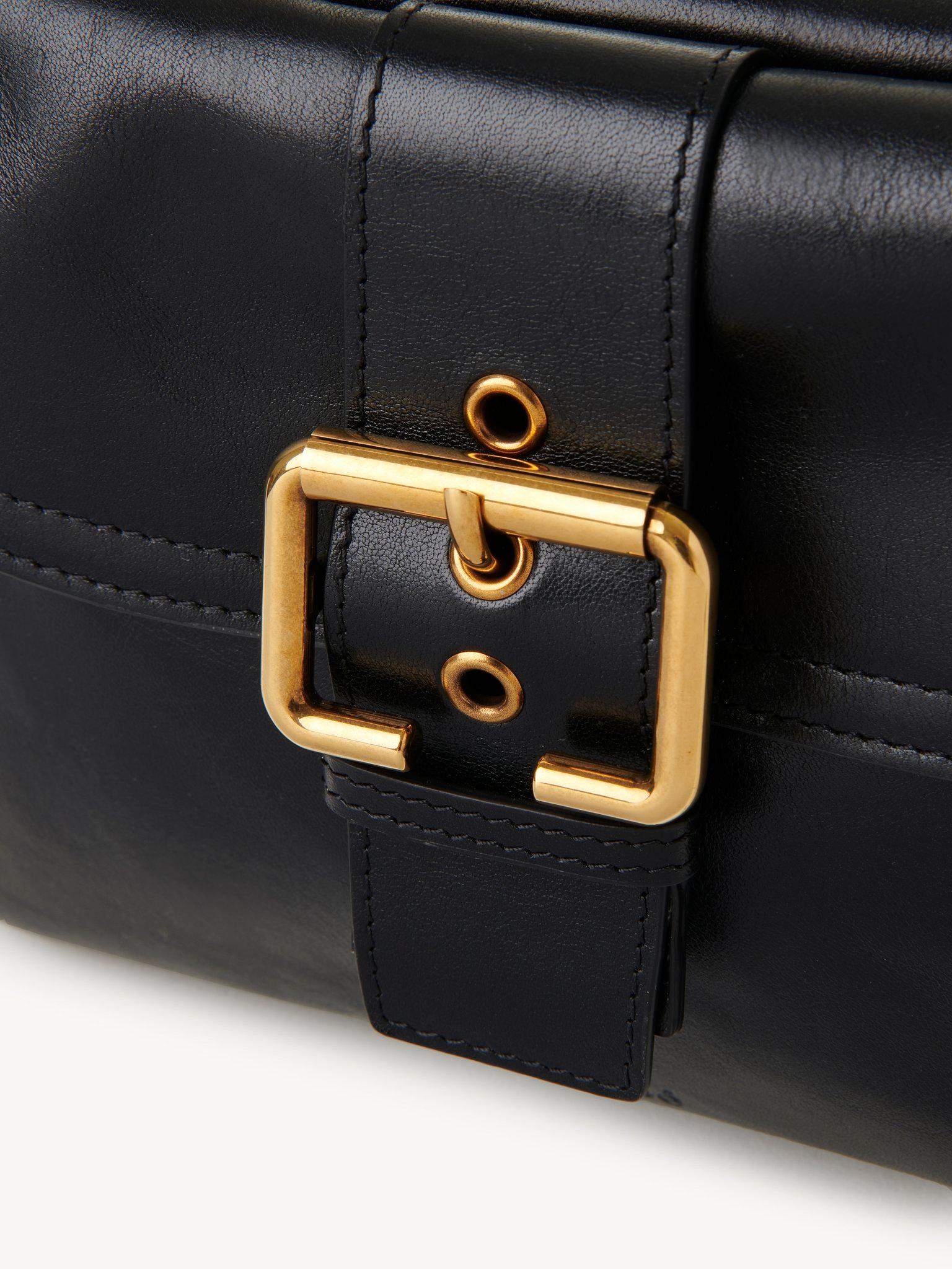 Camera bag in shiny leather Product Image