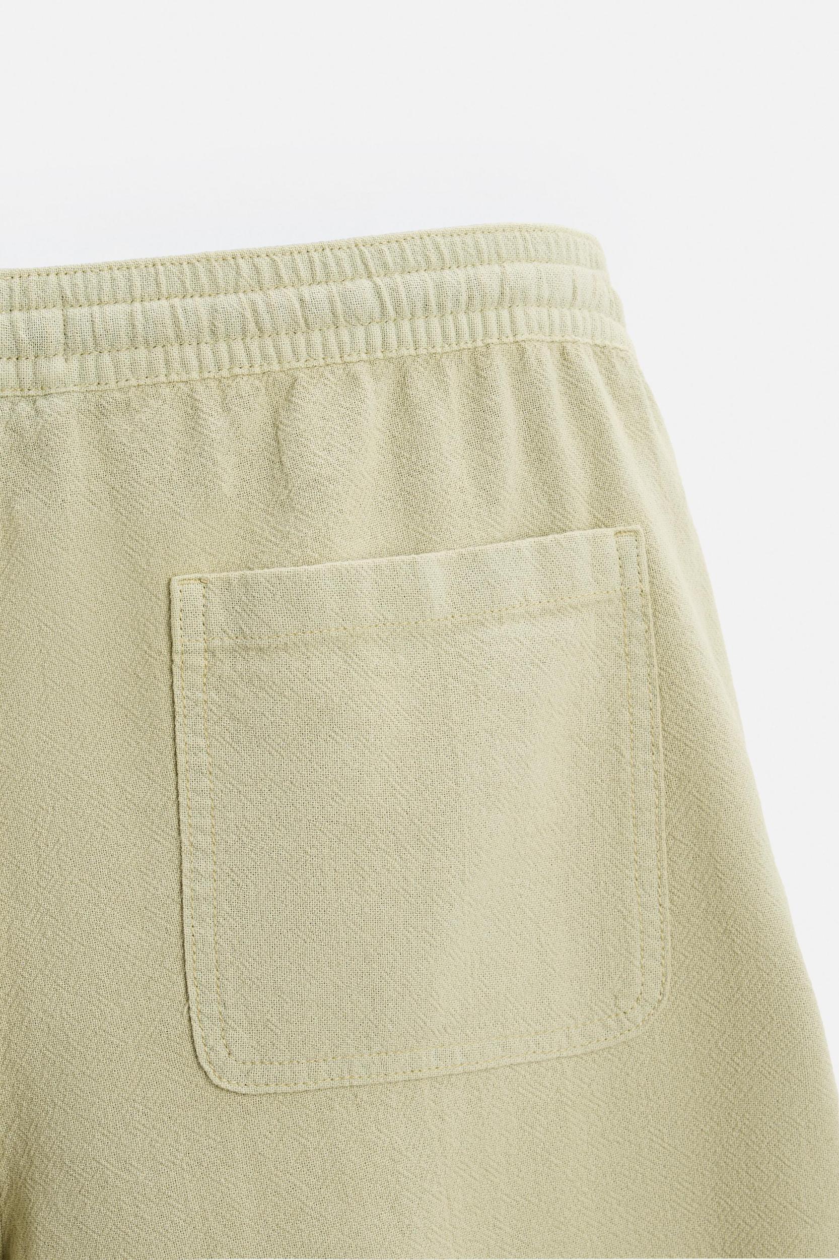 TEXTURED EMBROIDERED SHORTS Product Image