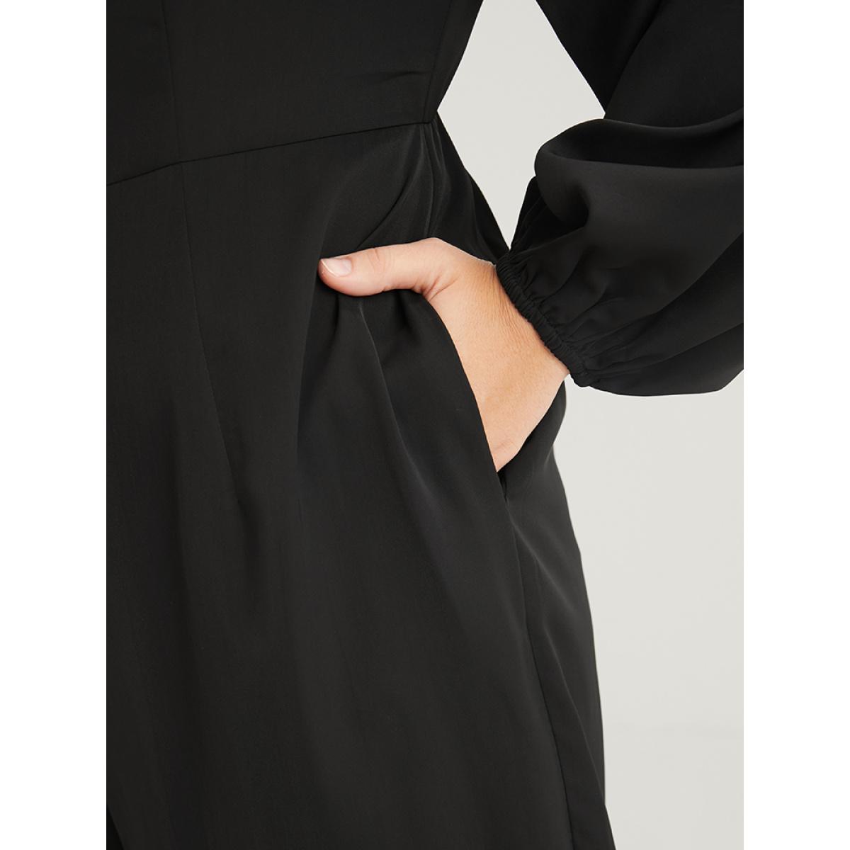 Plus Size Black Solid Button Front Lantern Sleeve Pocket Wide Leg Jumpsuit Women Office Long Sleeve V-neck Office Loose Jumpsuits BloomChic 18-20/2X Product Image