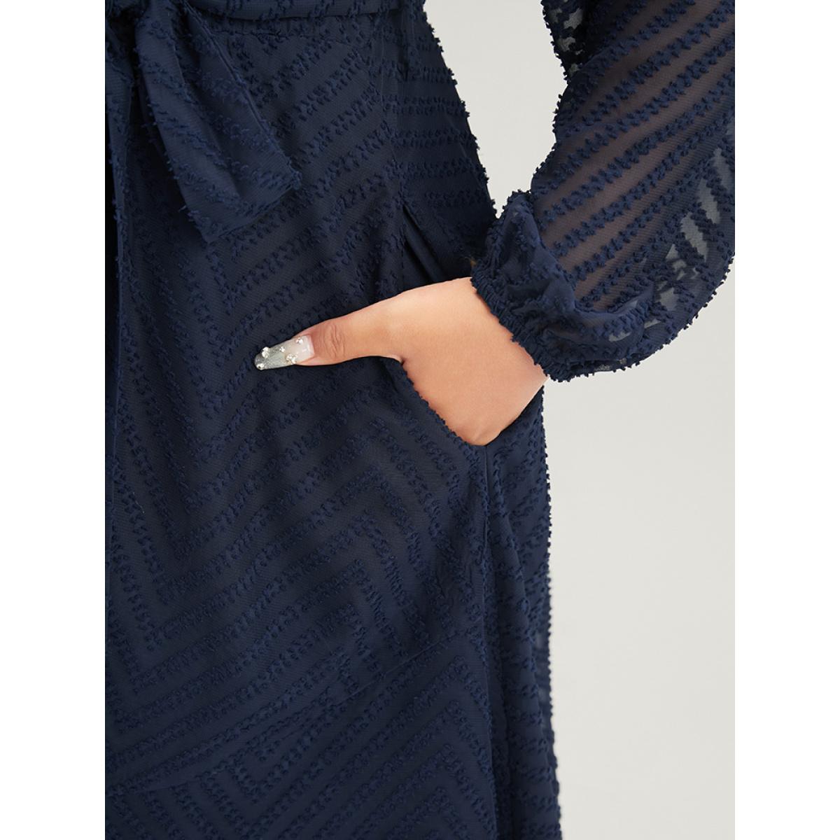 Plus Size Solid Geometric Wrap Pocket Belted Asymmetrical Hem Dress DarkBlue Women Glamour Plain V-neck Long Sleeve Curvy Long Dress BloomChic 12/L Product Image
