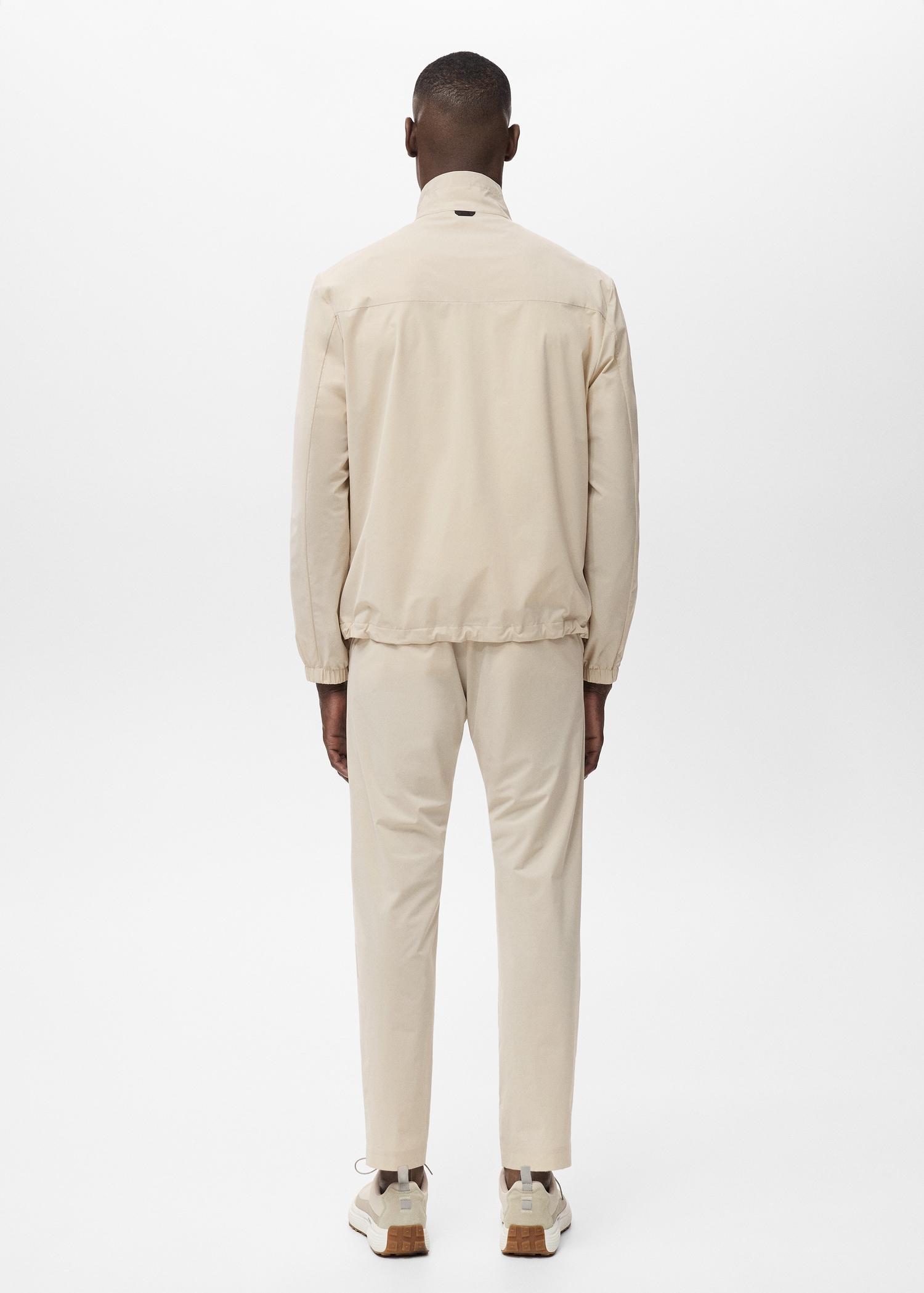 Slim-fit water-repellent pants - Men | MANGO USA Product Image