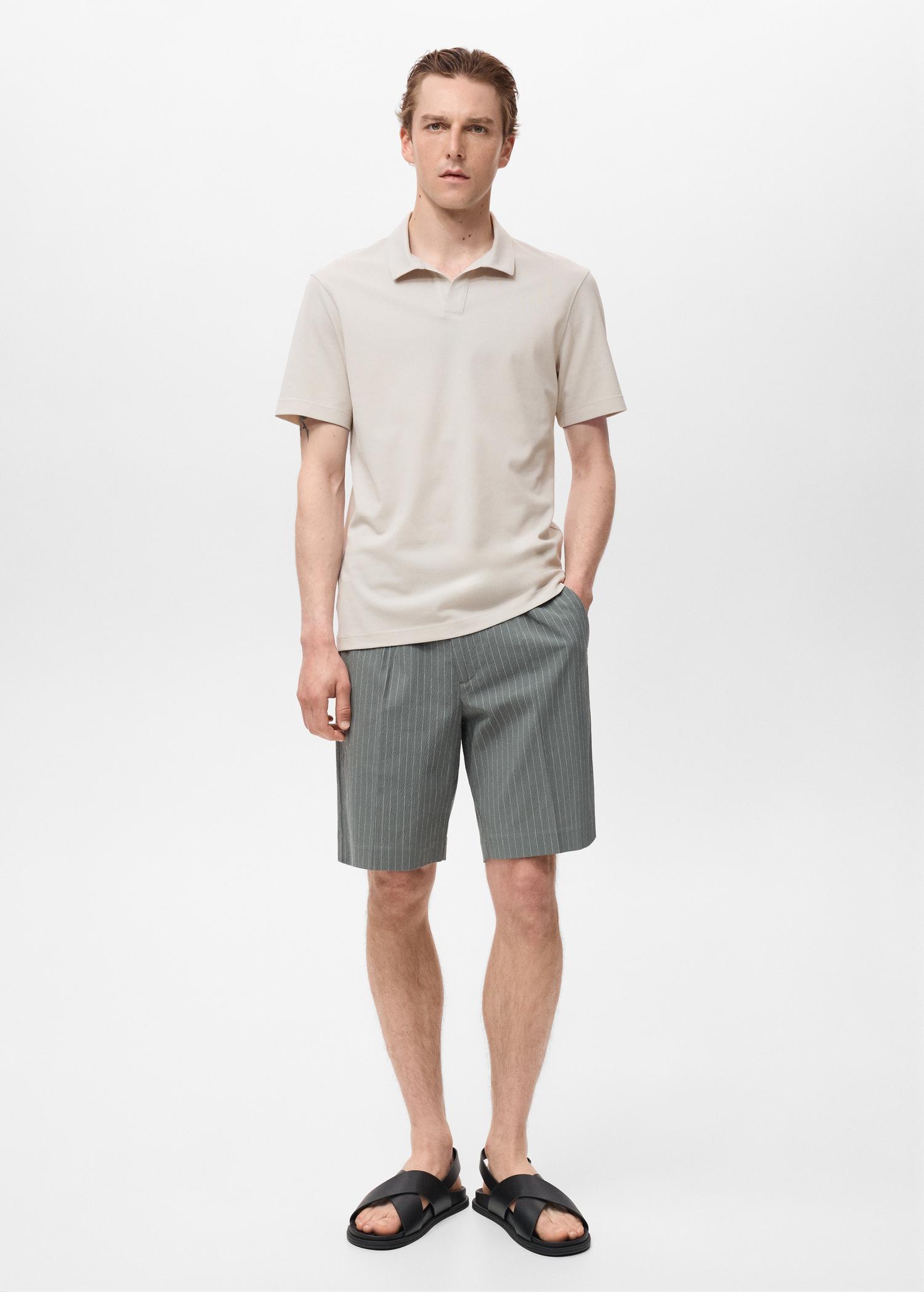 Cotton piqué polo shirt - Men | MANGO USA Product Image