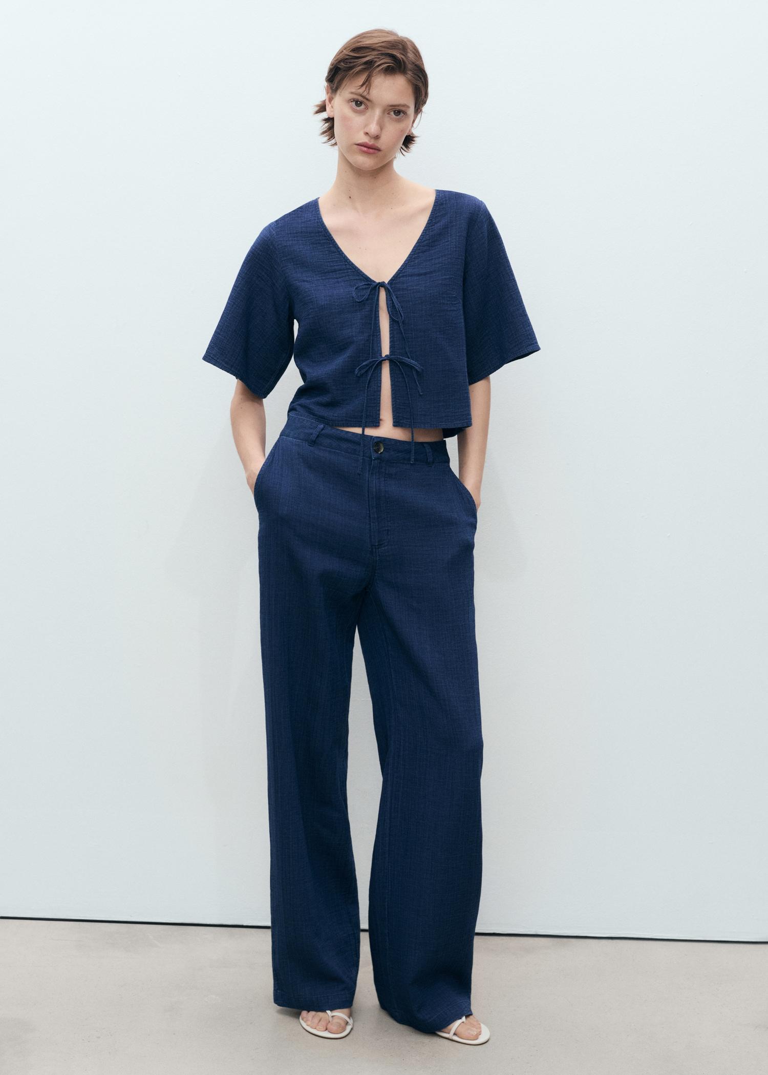 Flowy denim top with bows - Women | MANGO USA Product Image