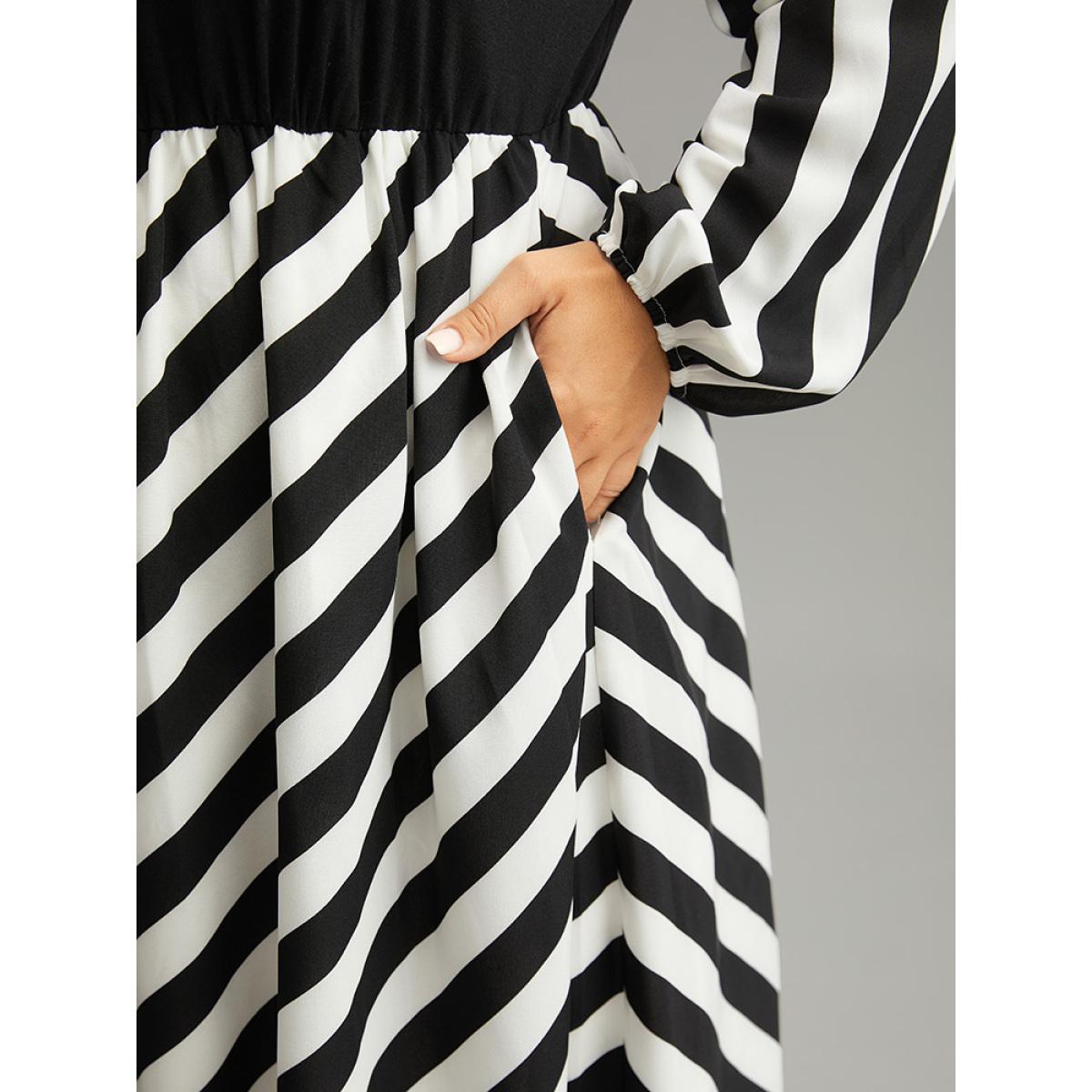 Plus Size Striped Patchwork Elastic Waist Lantern Sleeve Dress Black Women At the Office Elastic cuffs V-neck Long Sleeve Curvy Midi Dress BloomChic 26/4X Product Image