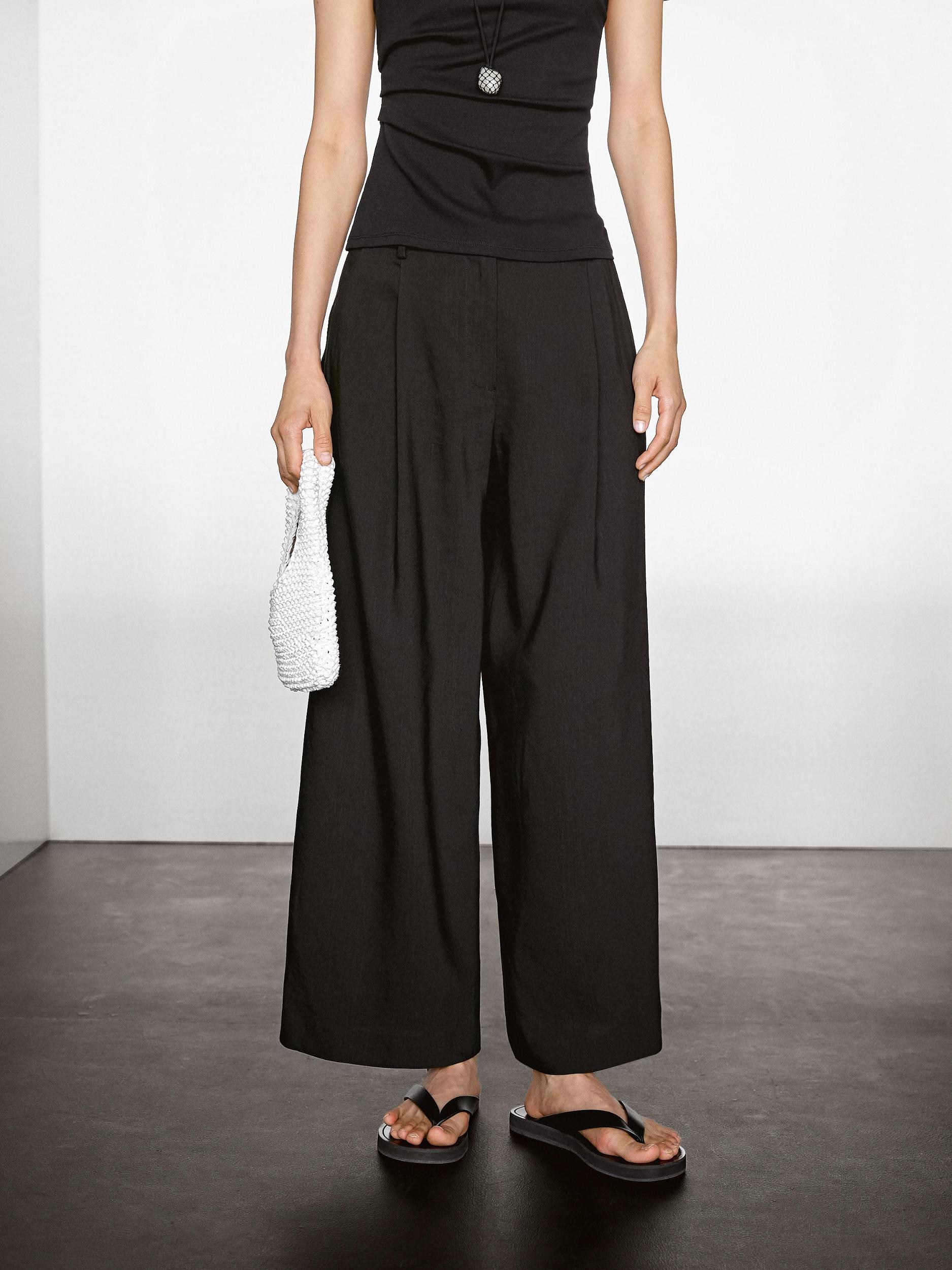 Flowing linen blend trousers with darts Product Image