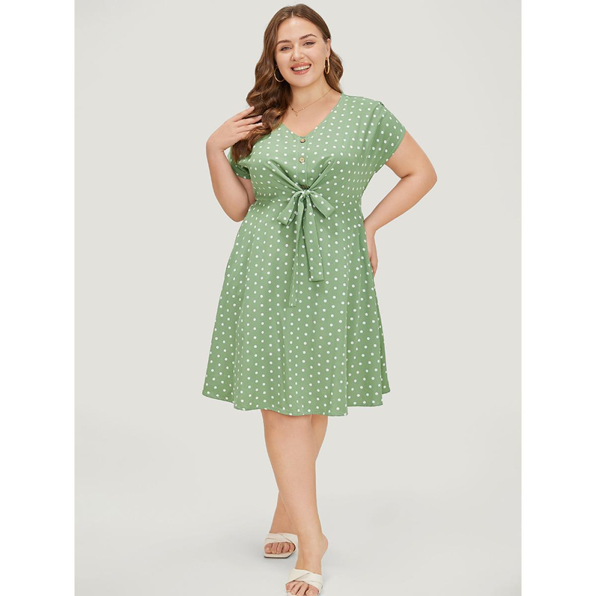 Plus Size Polka Dot Pocket Button Detail Twist Front Knee Dress Green Women Elegant Knotted V-neck Cap Sleeve Curvy Knee Dress BloomChic 14-16/1X Product Image