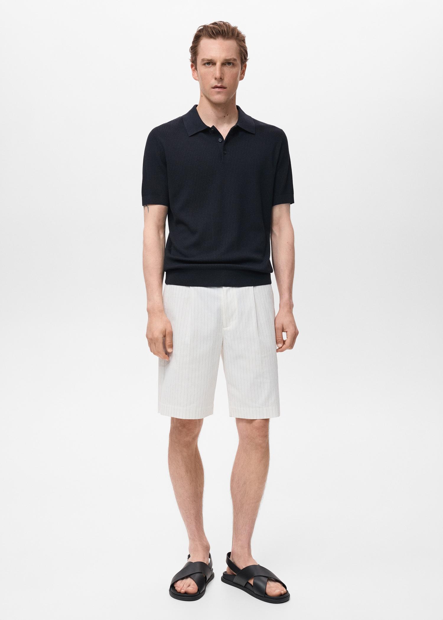 Ribbed knit polo shirt - Men | MANGO USA Product Image