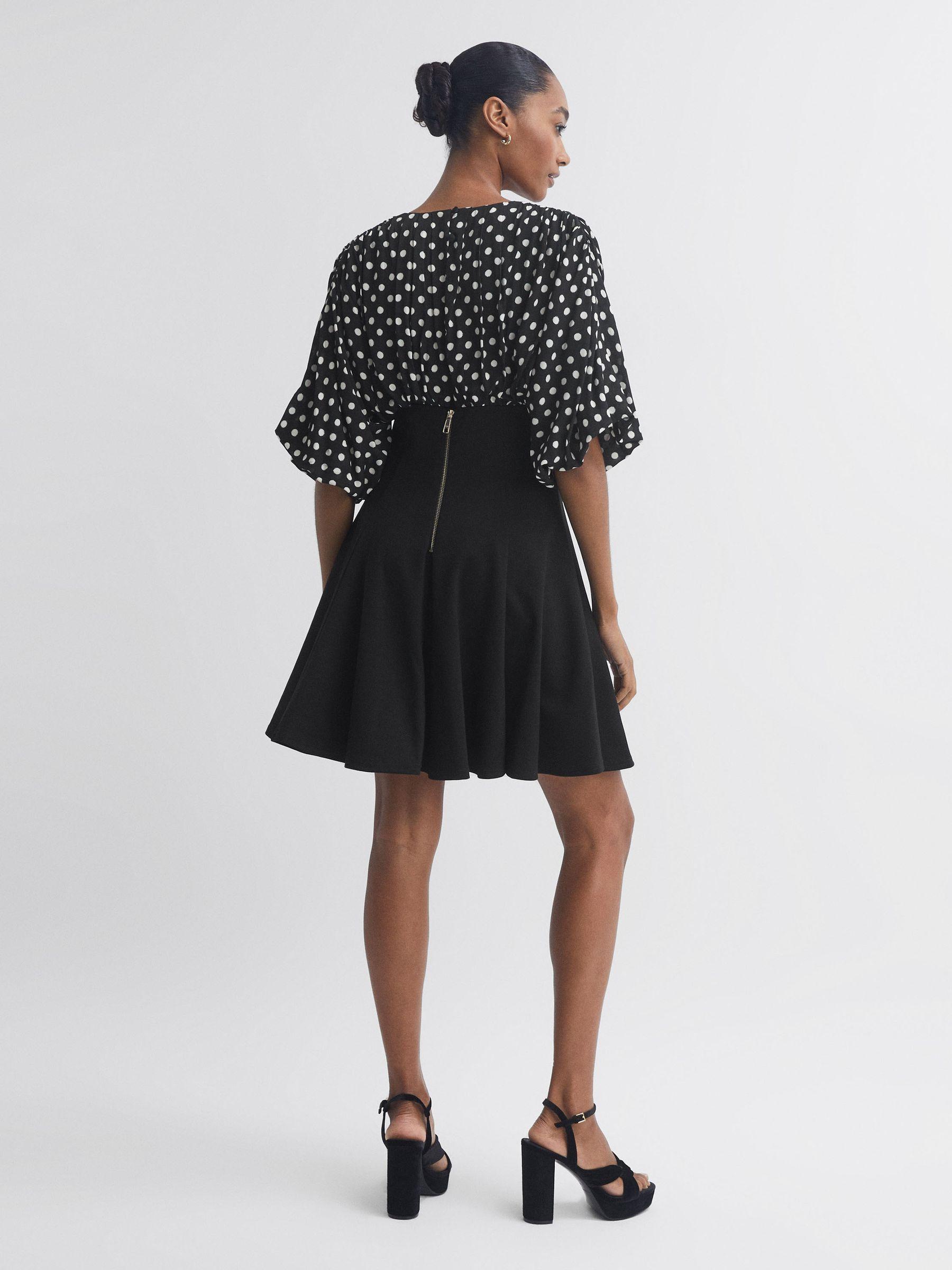 Florere Polka Dot Mini Skater Dress in Black Product Image