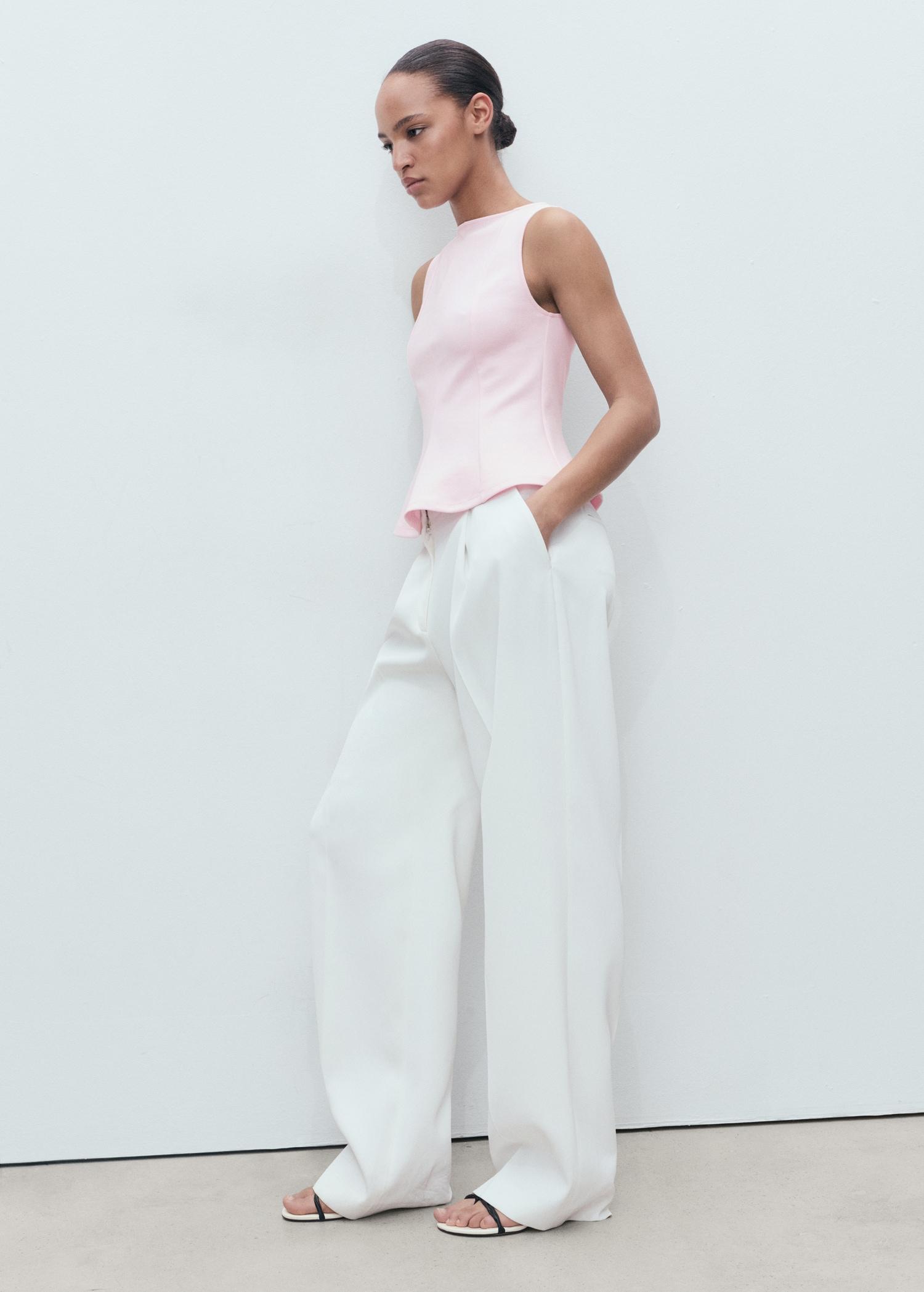 Peplum top with seam detail - Women | MANGO USA Product Image