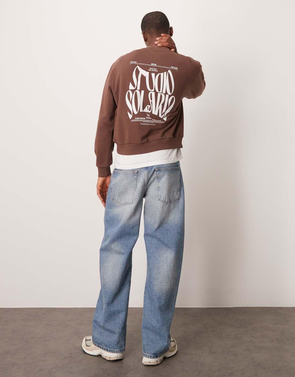 ASOS DESIGN boxy oversized sweatshirt with print in brown Product Image