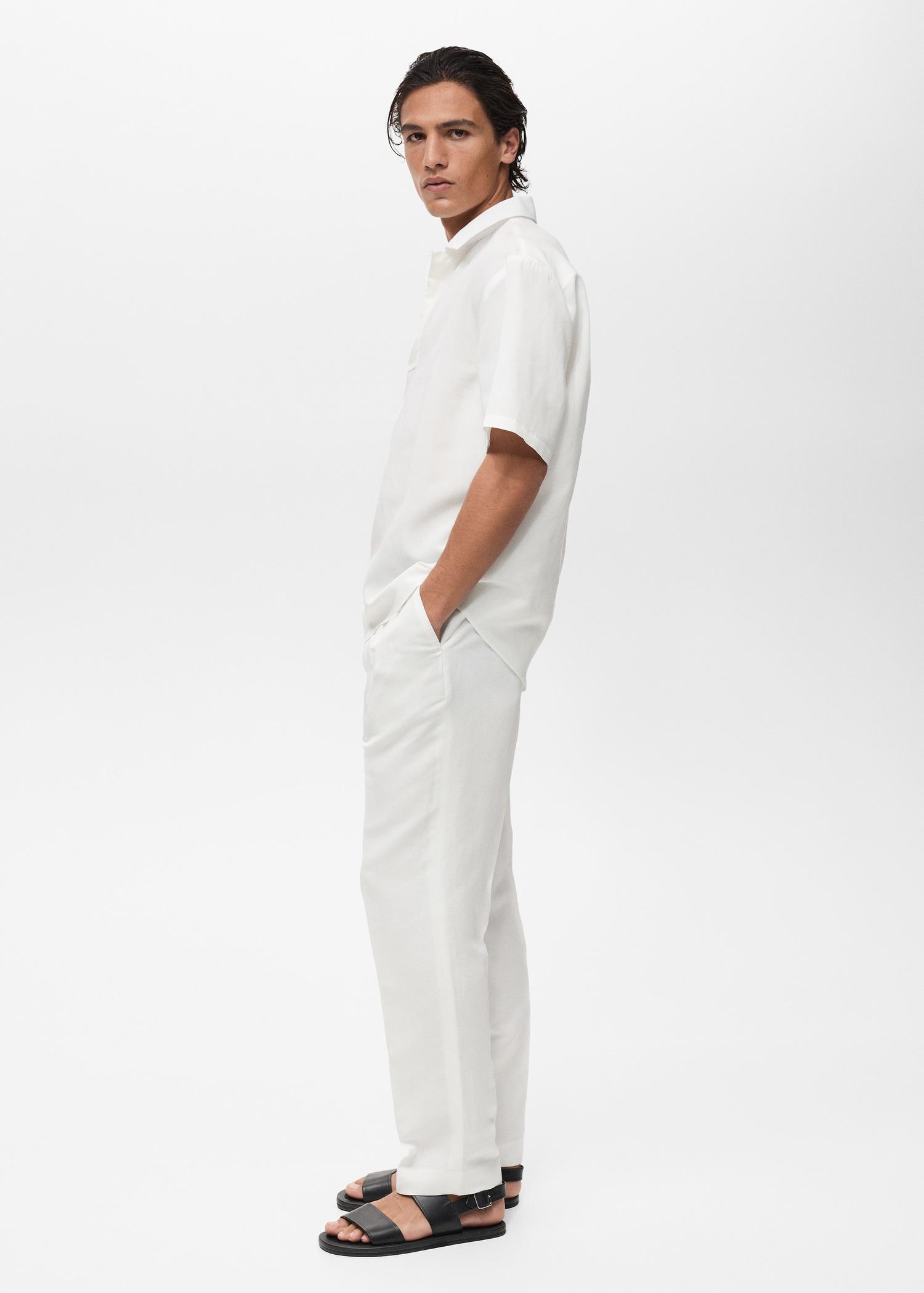 Lyocell linen regular-fit polo shirt - Men | MANGO USA Product Image