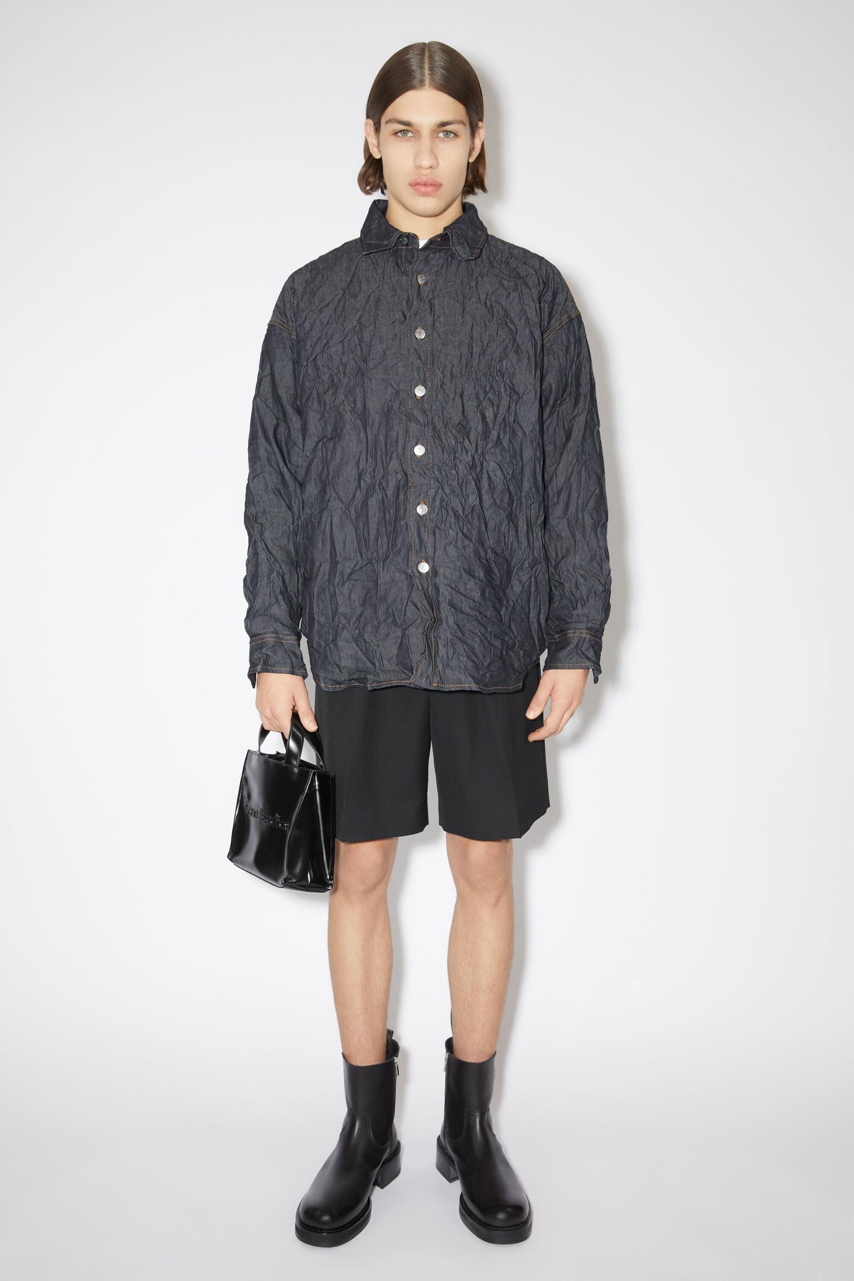 Glossed low leather boots Product Image