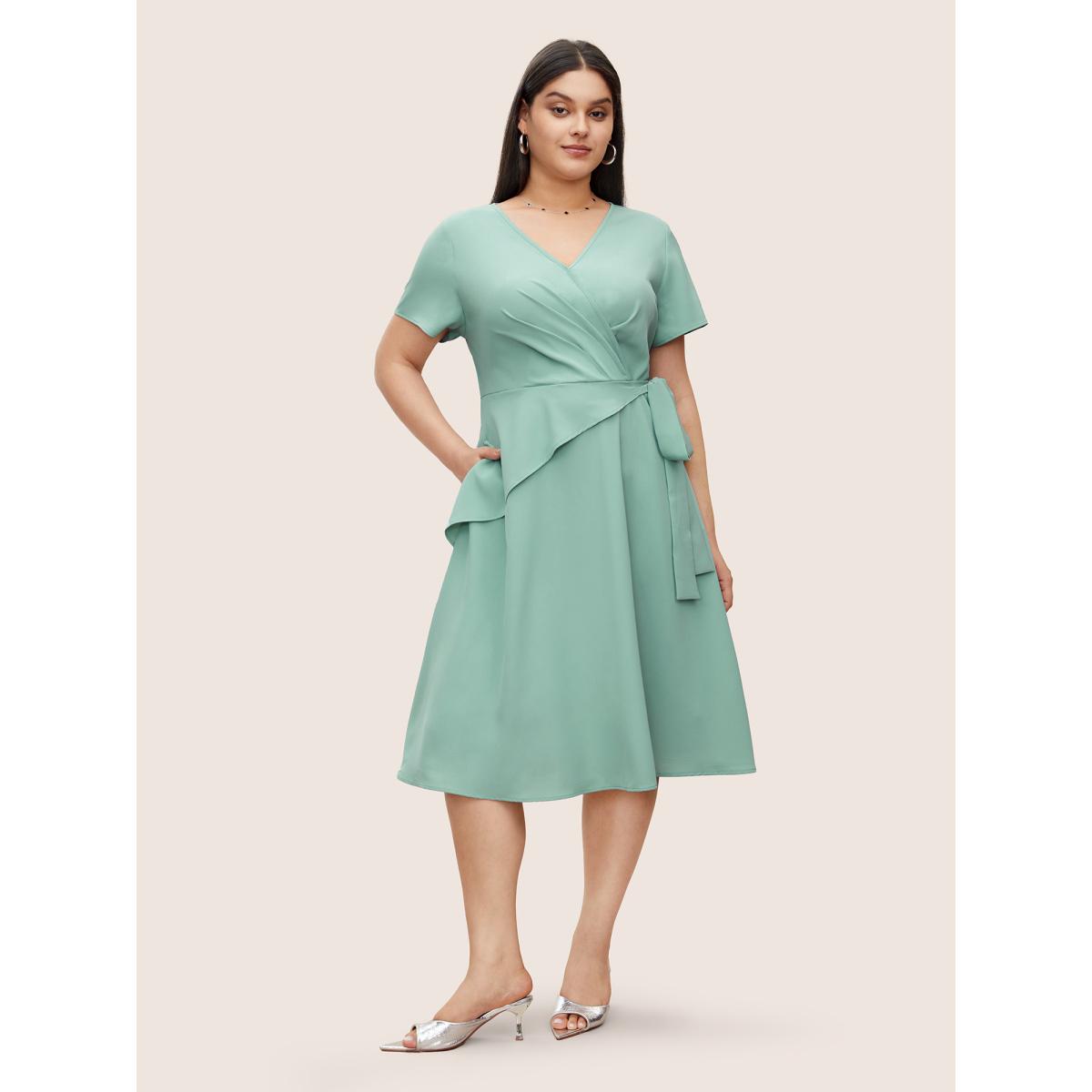Plus Size Static-Free Overlap Collar Pleated Tie Knot Dress Mint Women At the Office Overlapping Overlap Collar Short sleeve Curvy Midi Dress BloomChic 26/4X Product Image