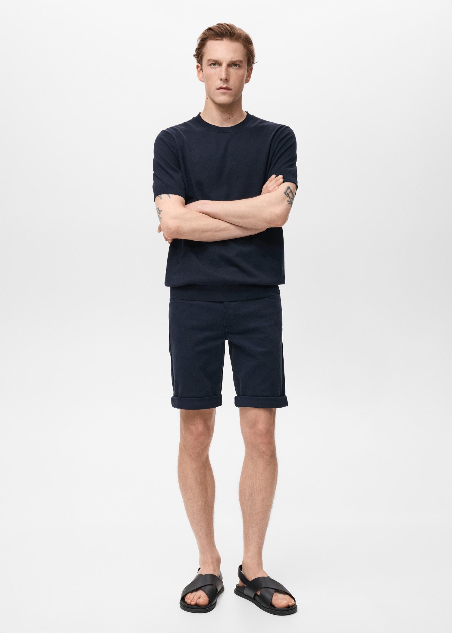 Slim-fit denim bermuda shorts - Men | MANGO USA Product Image