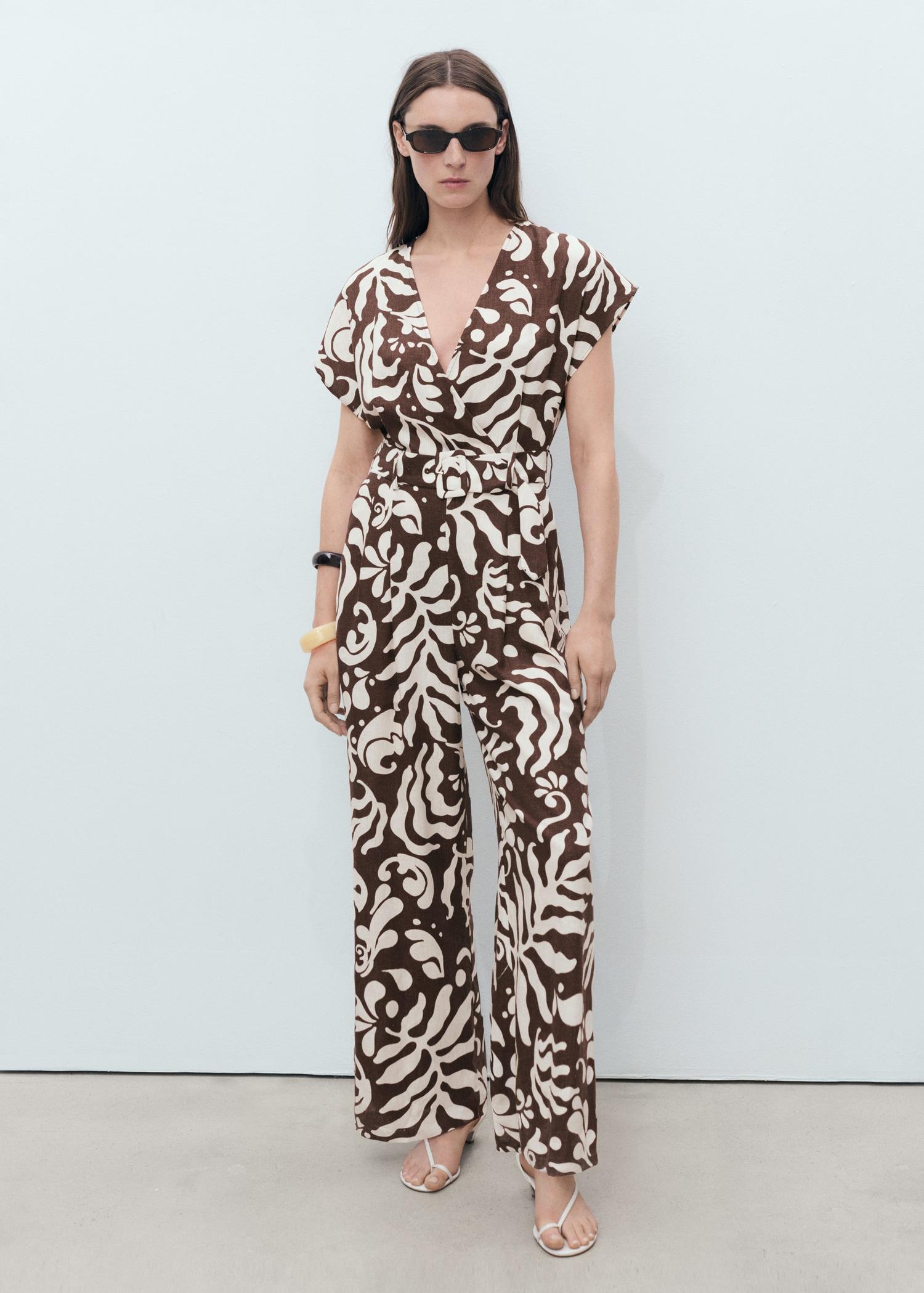 Printed linen jumpsuit with belt - Women | MANGO USA Product Image
