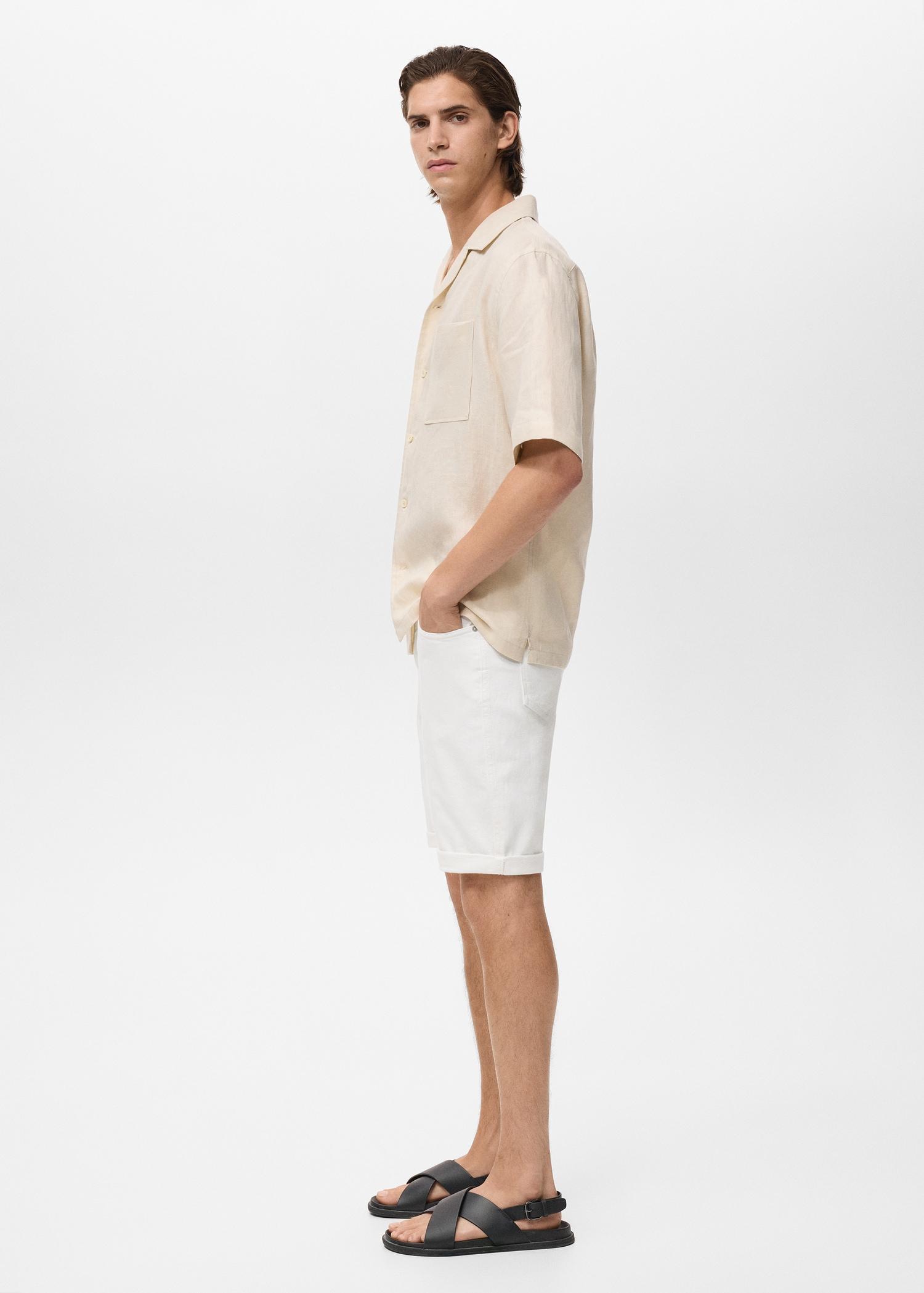 Slim-fit denim bermuda shorts - Men | MANGO USA Product Image