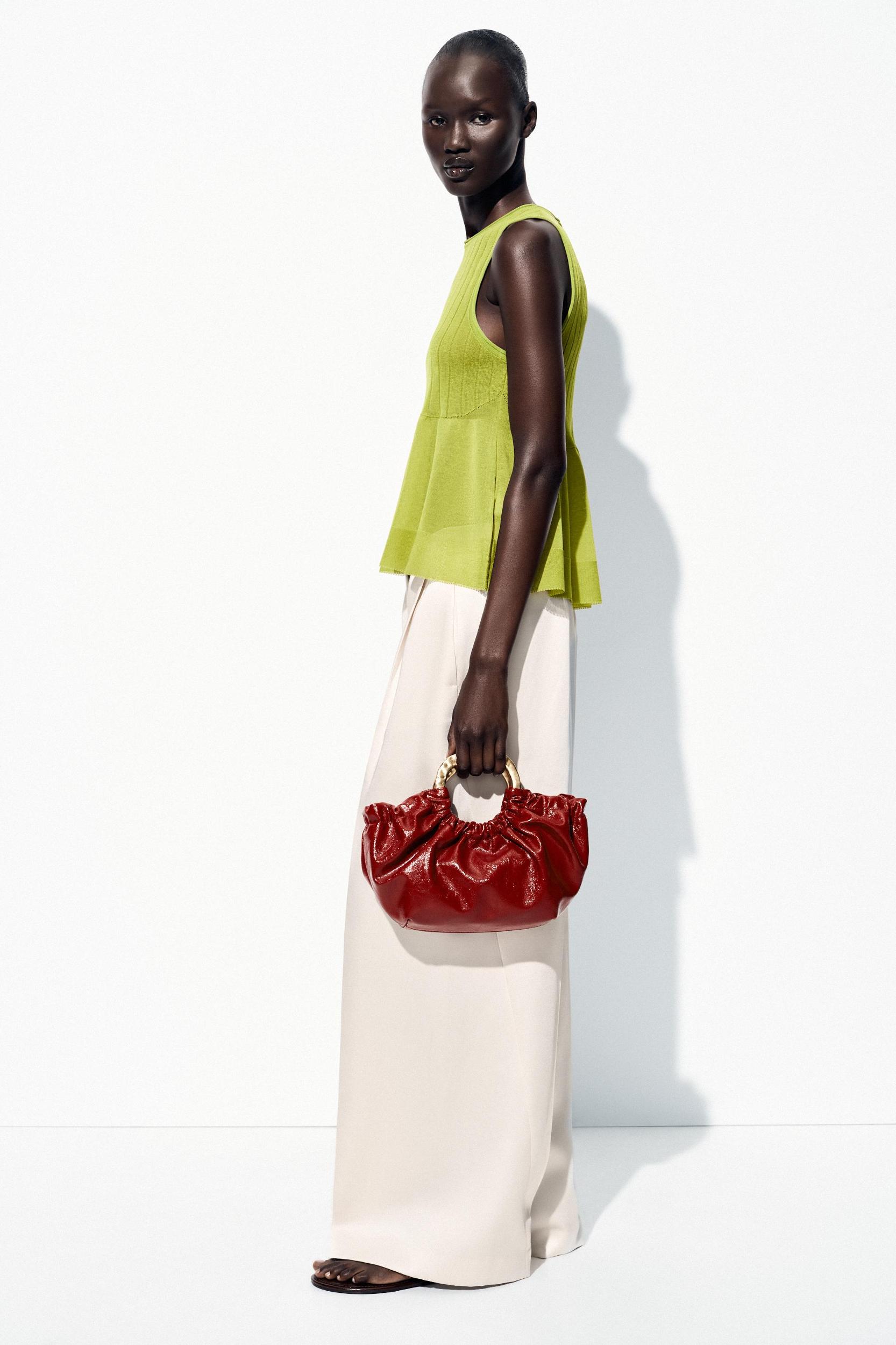 RUFFLED HEM KNIT TOP Product Image