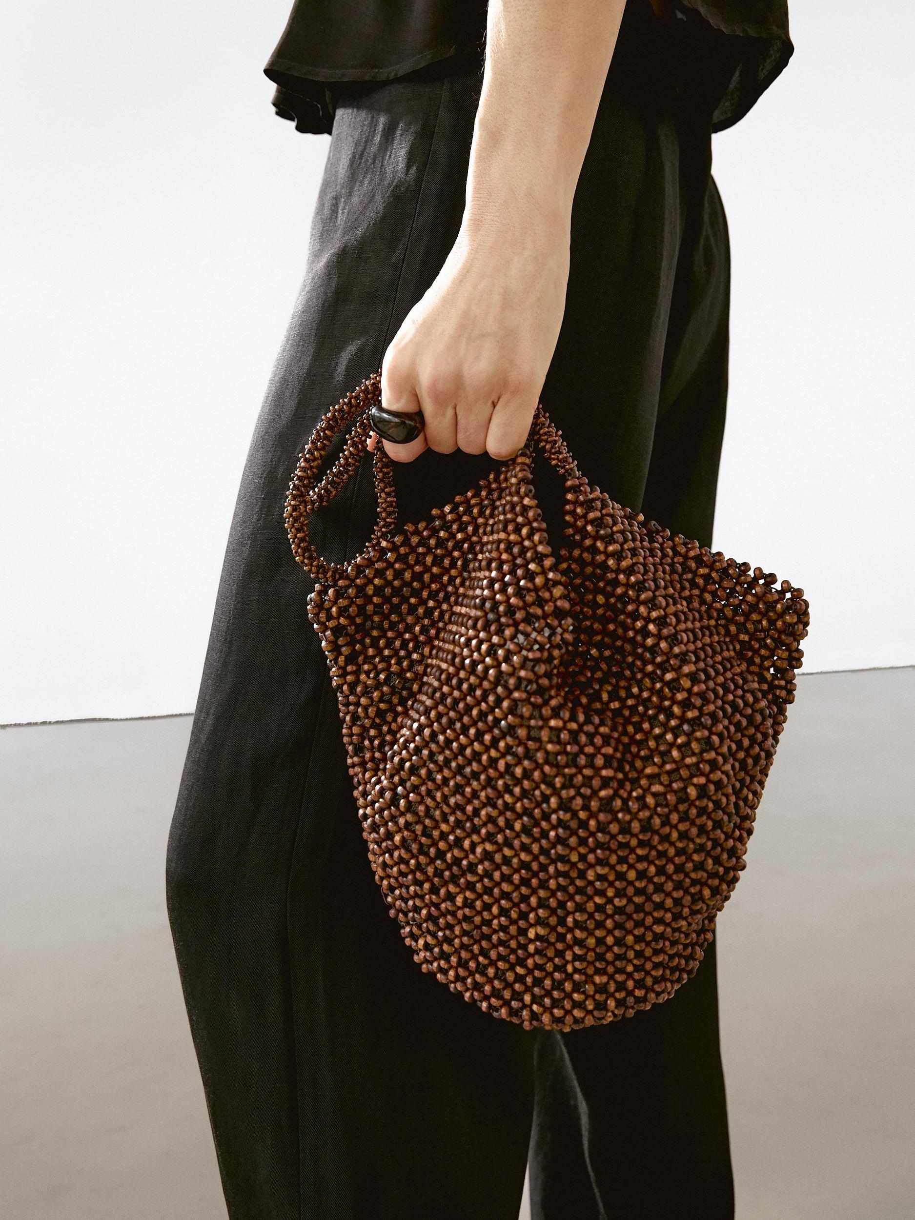 Flowing halter top with gathered detail Product Image