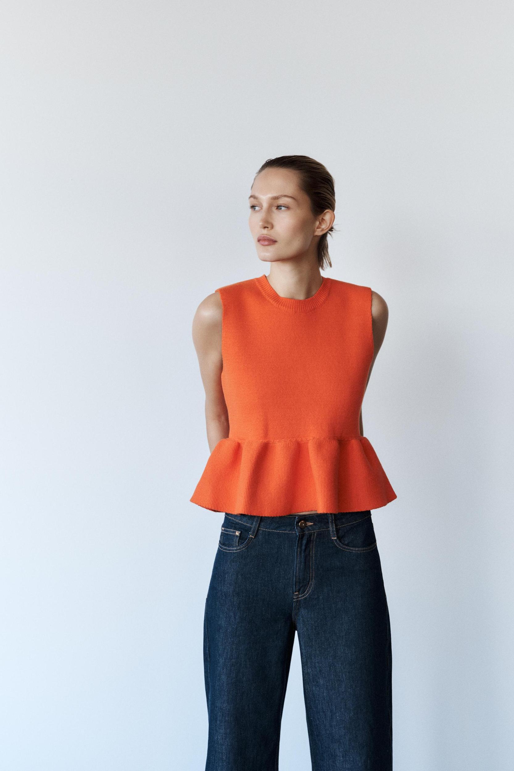 KNIT PEPLUM TOP Product Image