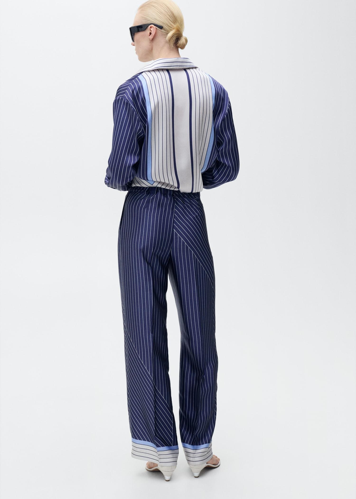 Satin pants with combined stripes - Women | MANGO USA Product Image