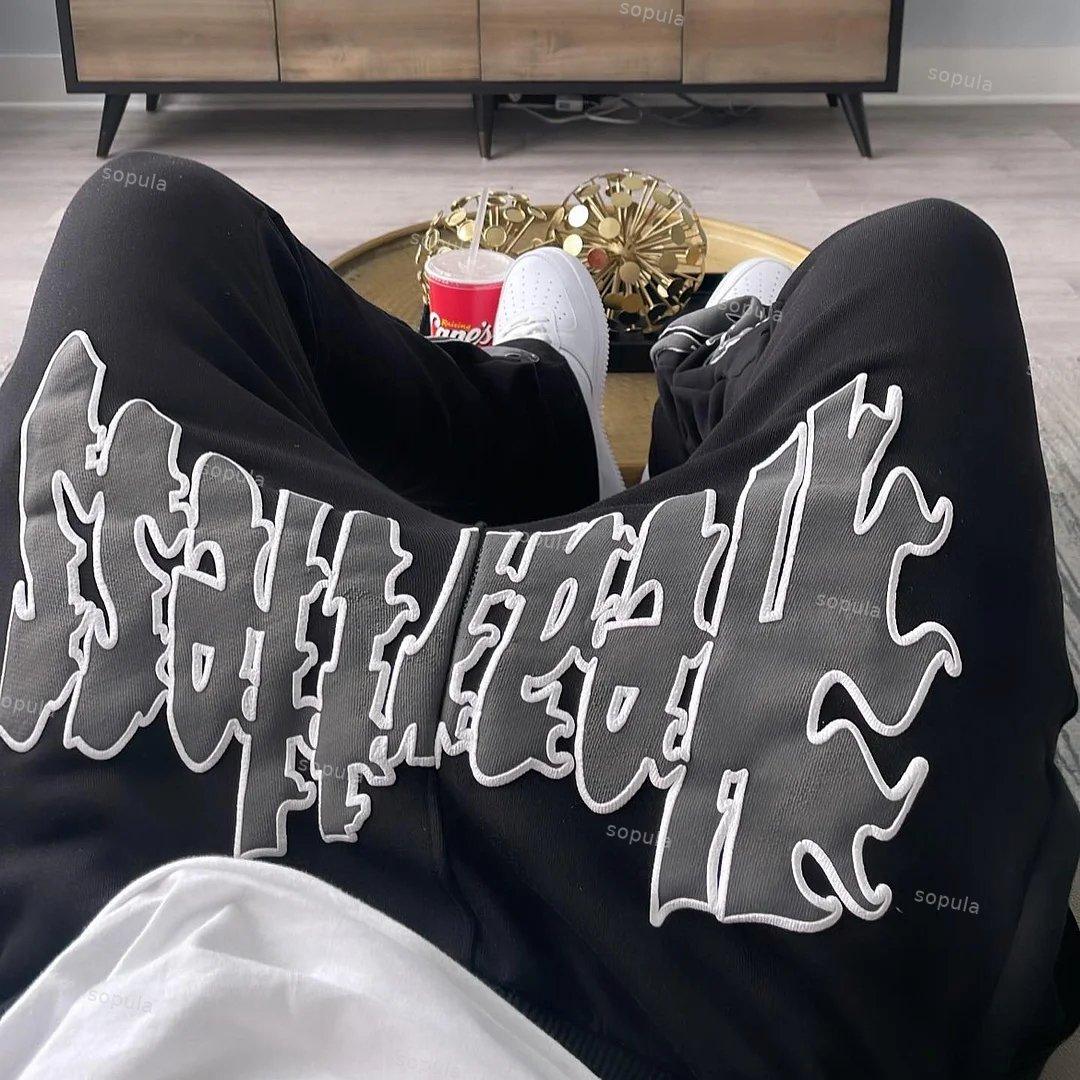 Sopula Heartless Graphic Men's Flared Sweatpants Product Image