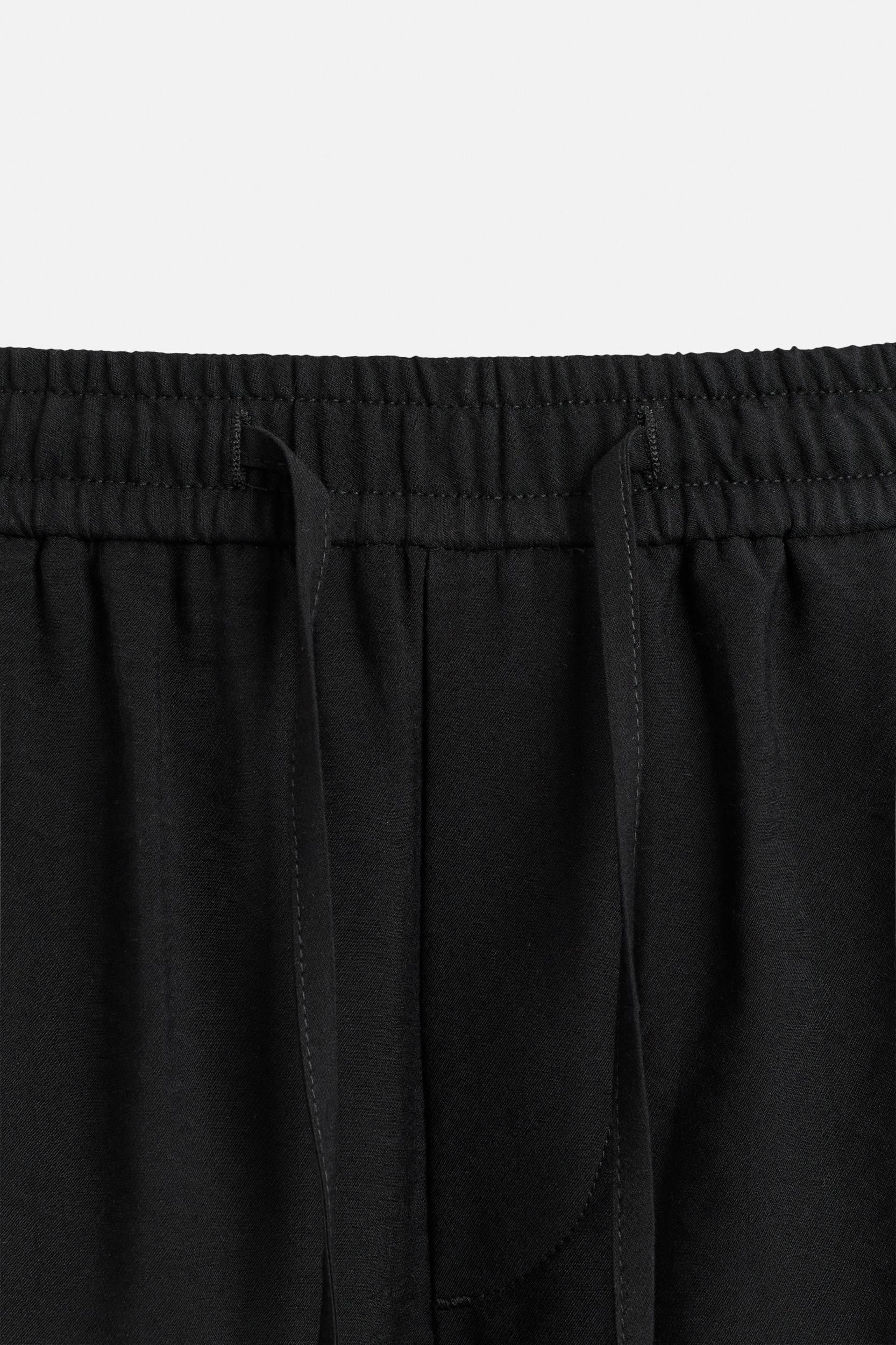 FLOWY RELAXED FIT BERMUDA SHORTS Product Image