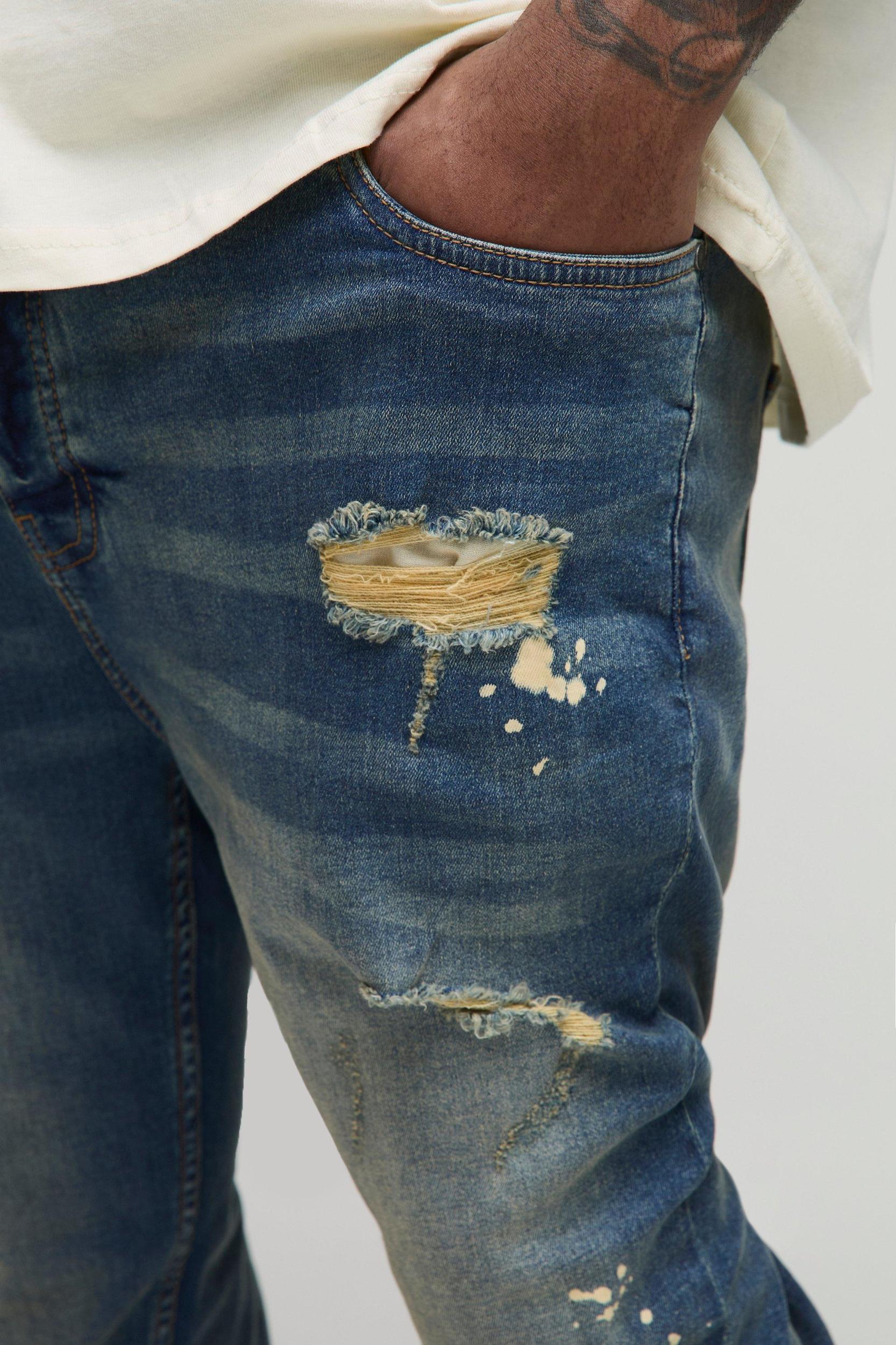 Plus Skinny All Over Ripped Bleached Paint Splatter Jeans | boohooMAN USA Product Image