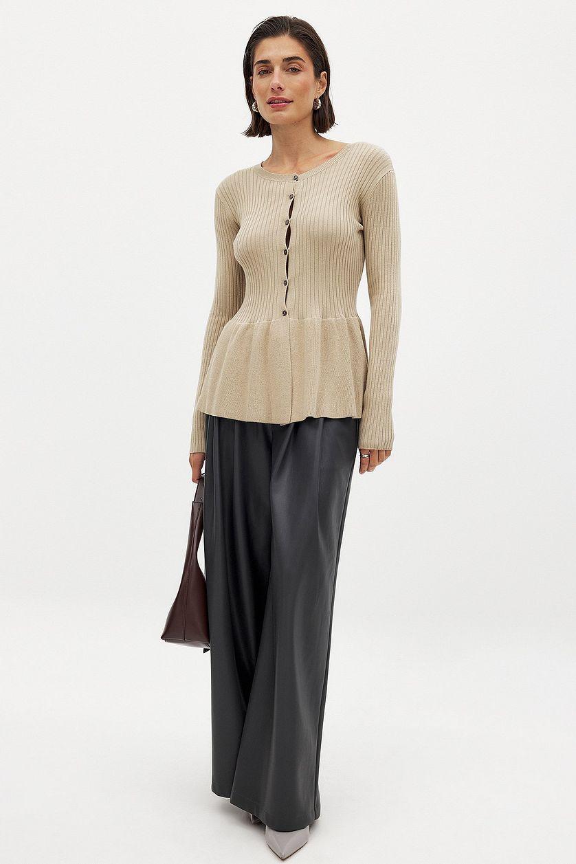 Knitted Peplum Top Beige Product Image