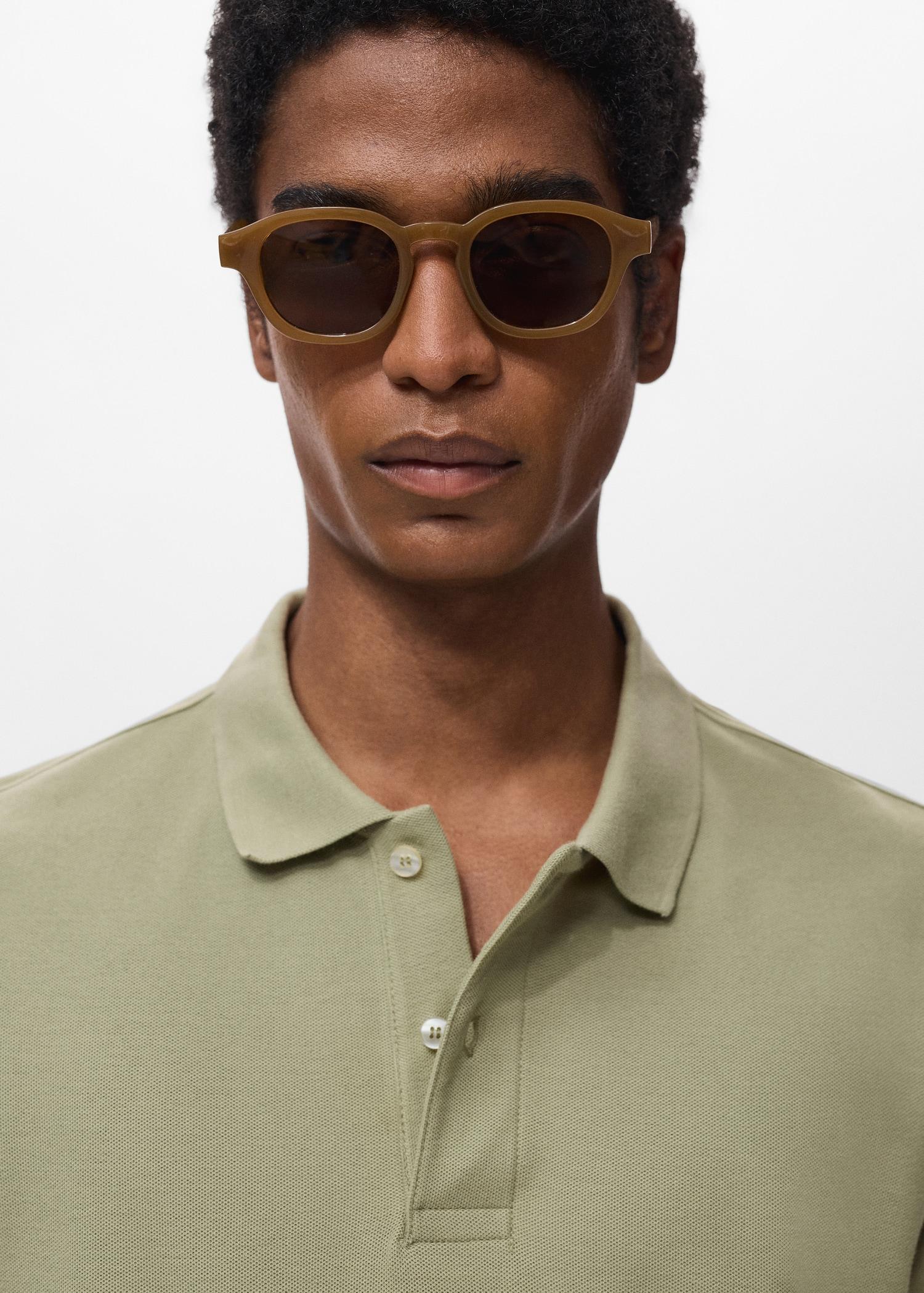 Regular-fit cotton piqué polo shirt - Men | MANGO USA Product Image