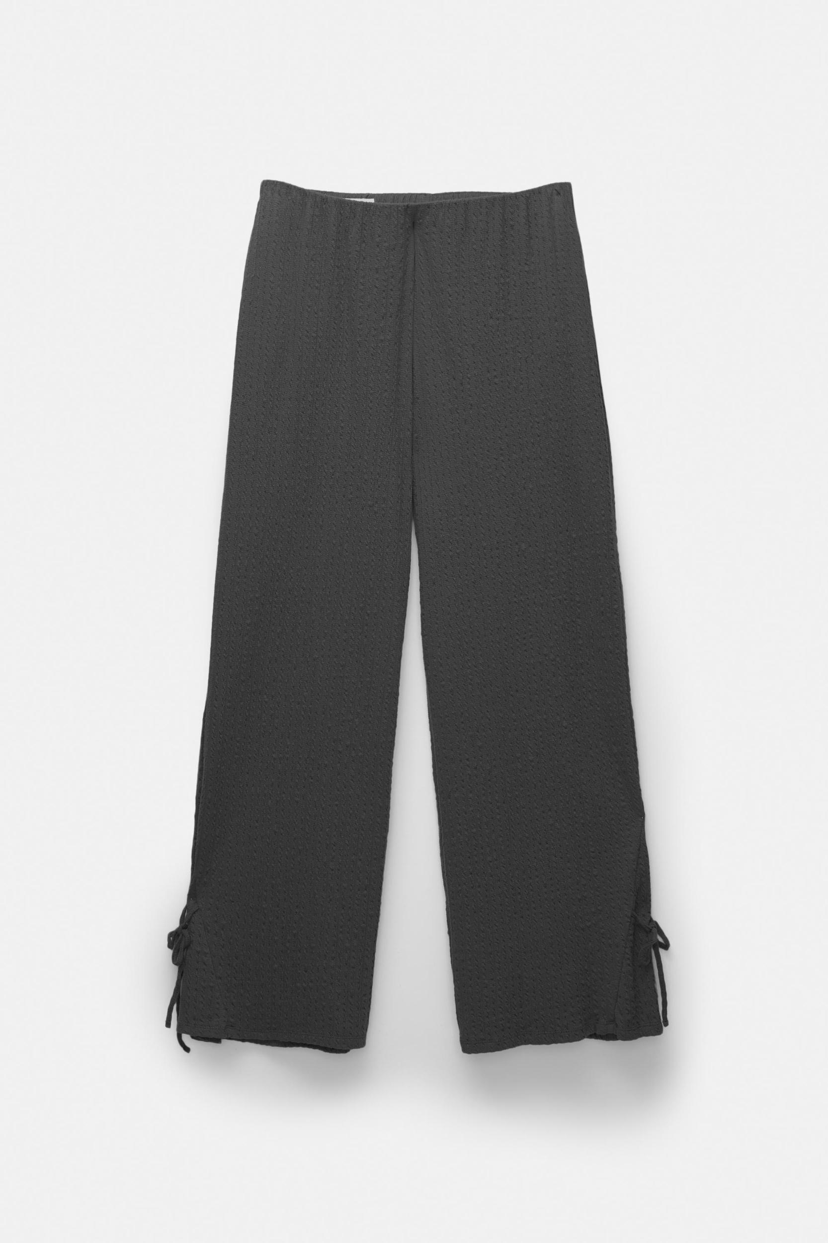 Rustic trousers with knot detail Product Image