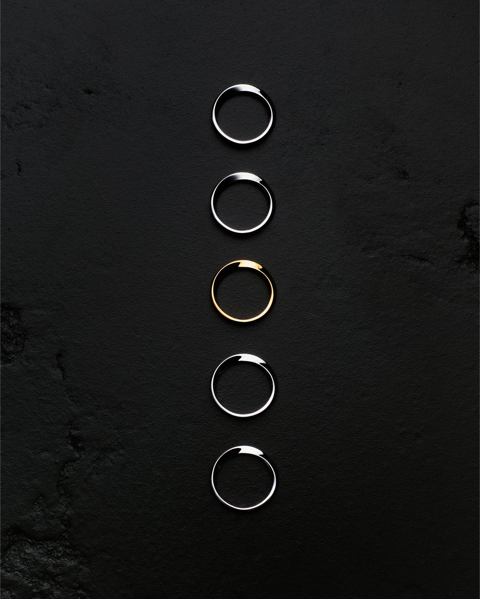 twist rings in 18K grey gold and 18K yellow gold Product Image