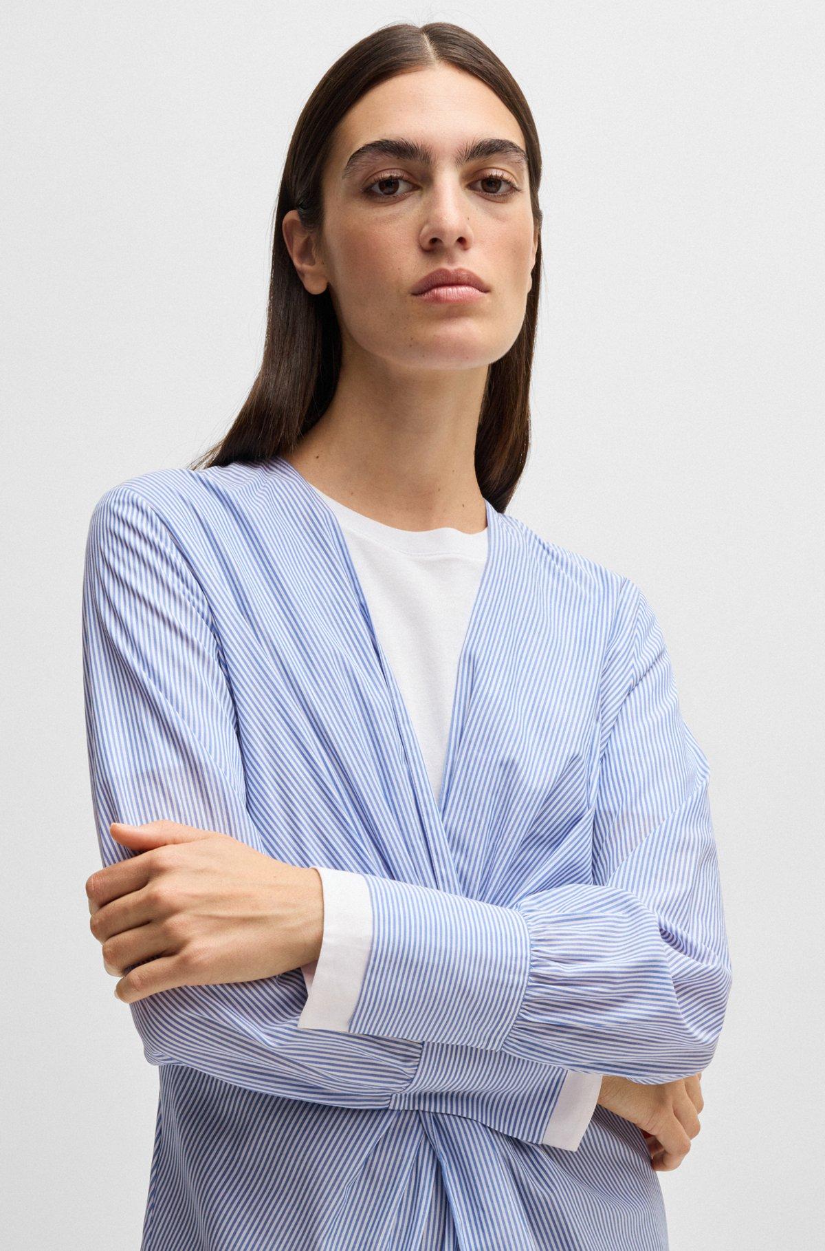 Twist-front slim-fit blouse in striped cotton Product Image