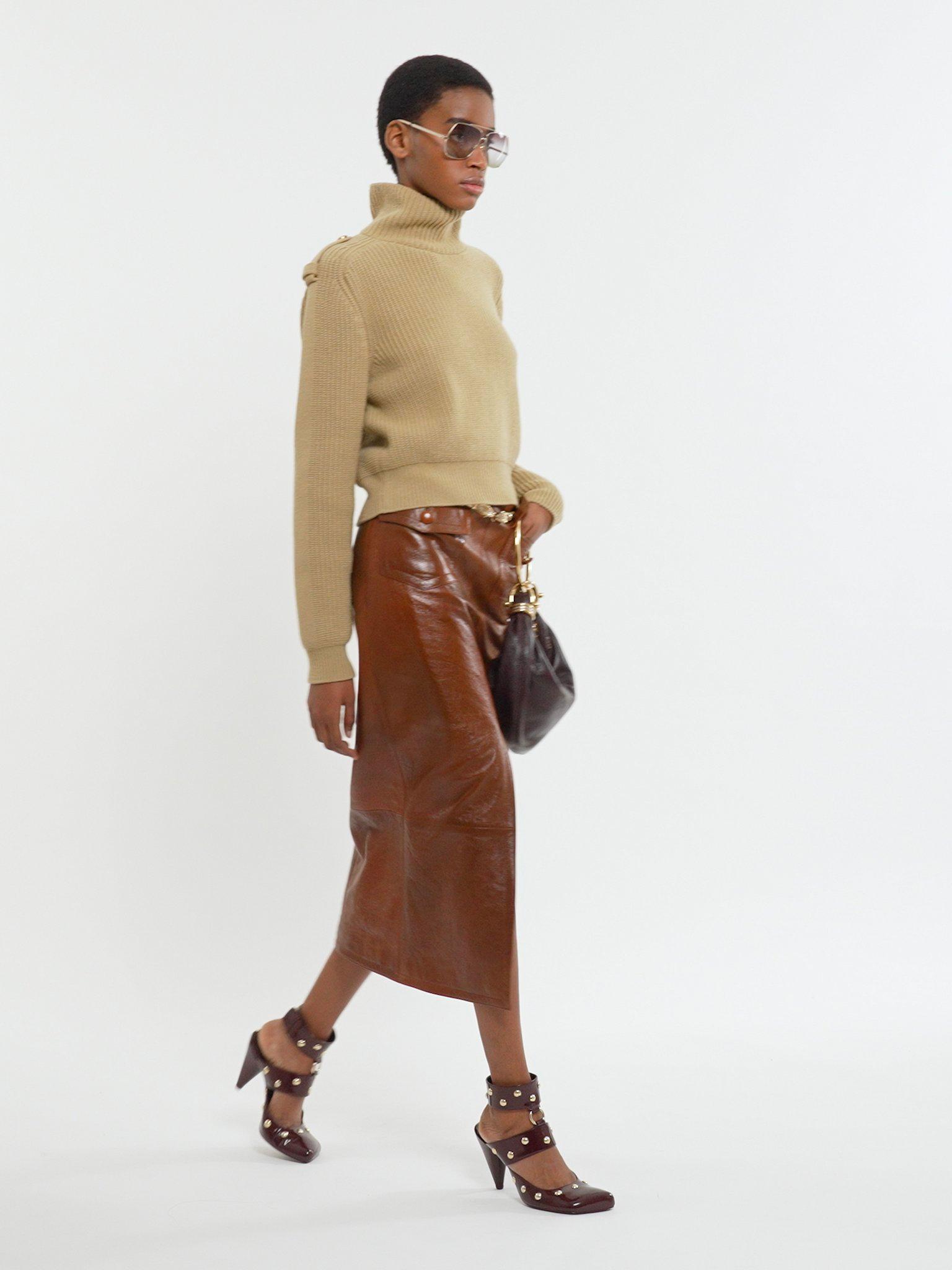 Front-slit midi skirt in glossy leather Product Image