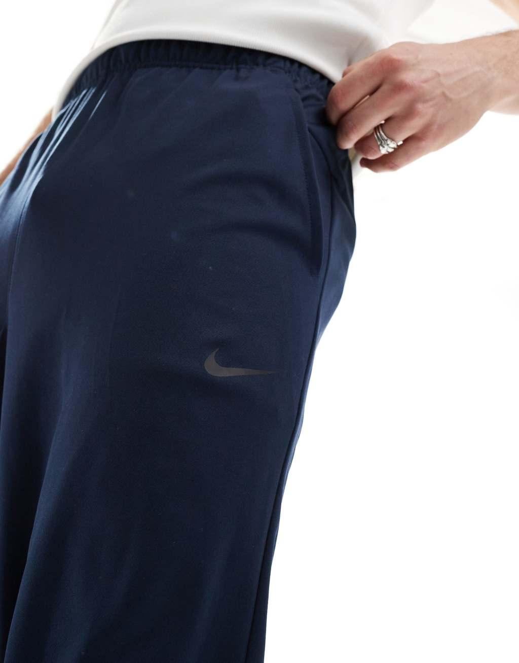 Nike Training Totality knit tapered sweatpants in navy Product Image