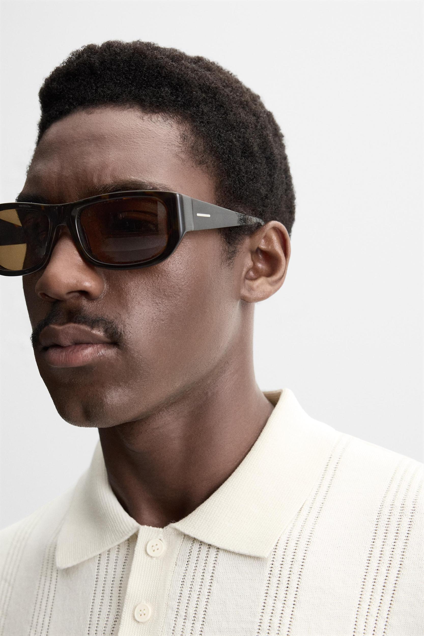 RIBBED KNIT POLO SHIRT Product Image