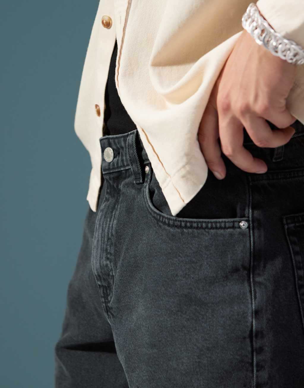 ASOS DESIGN wide flare jeans in washed black Product Image